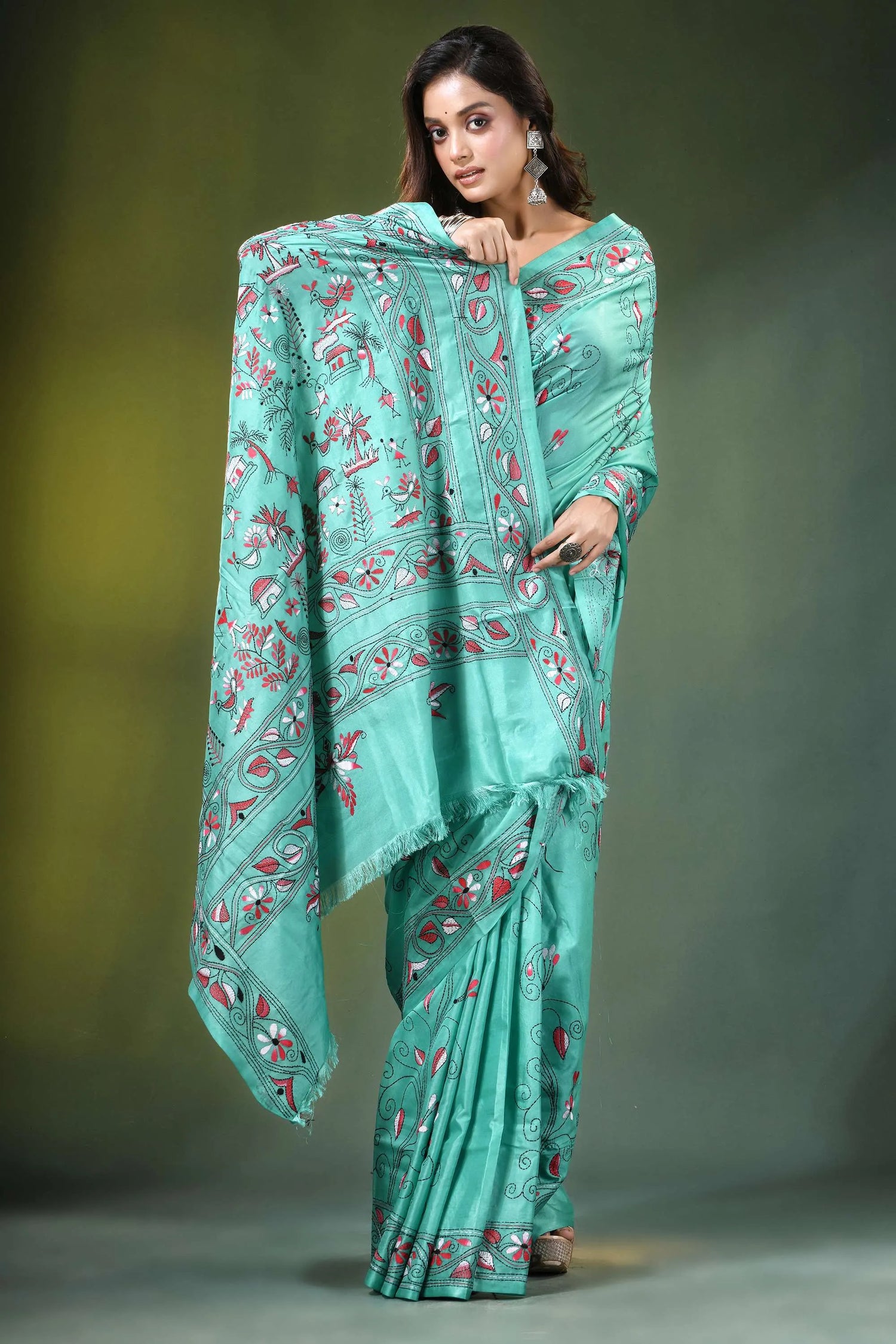 Mint green village theme kantha embroidery silk saree woman wears teal 5