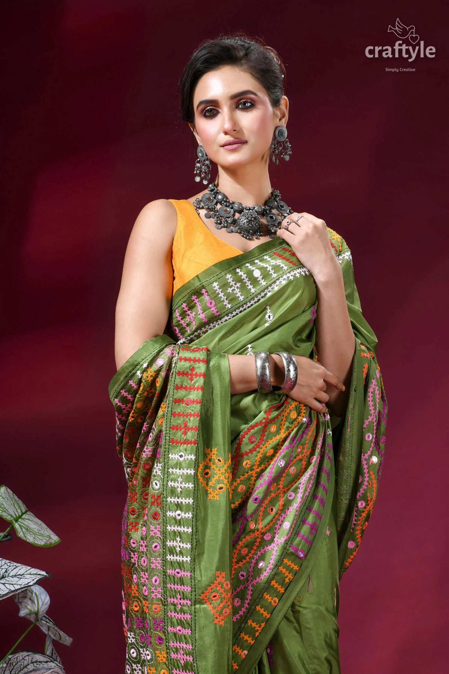 Muddy green dual-tone kutch work silk saree with mirror detailing green silk saree intricate embroidered 2