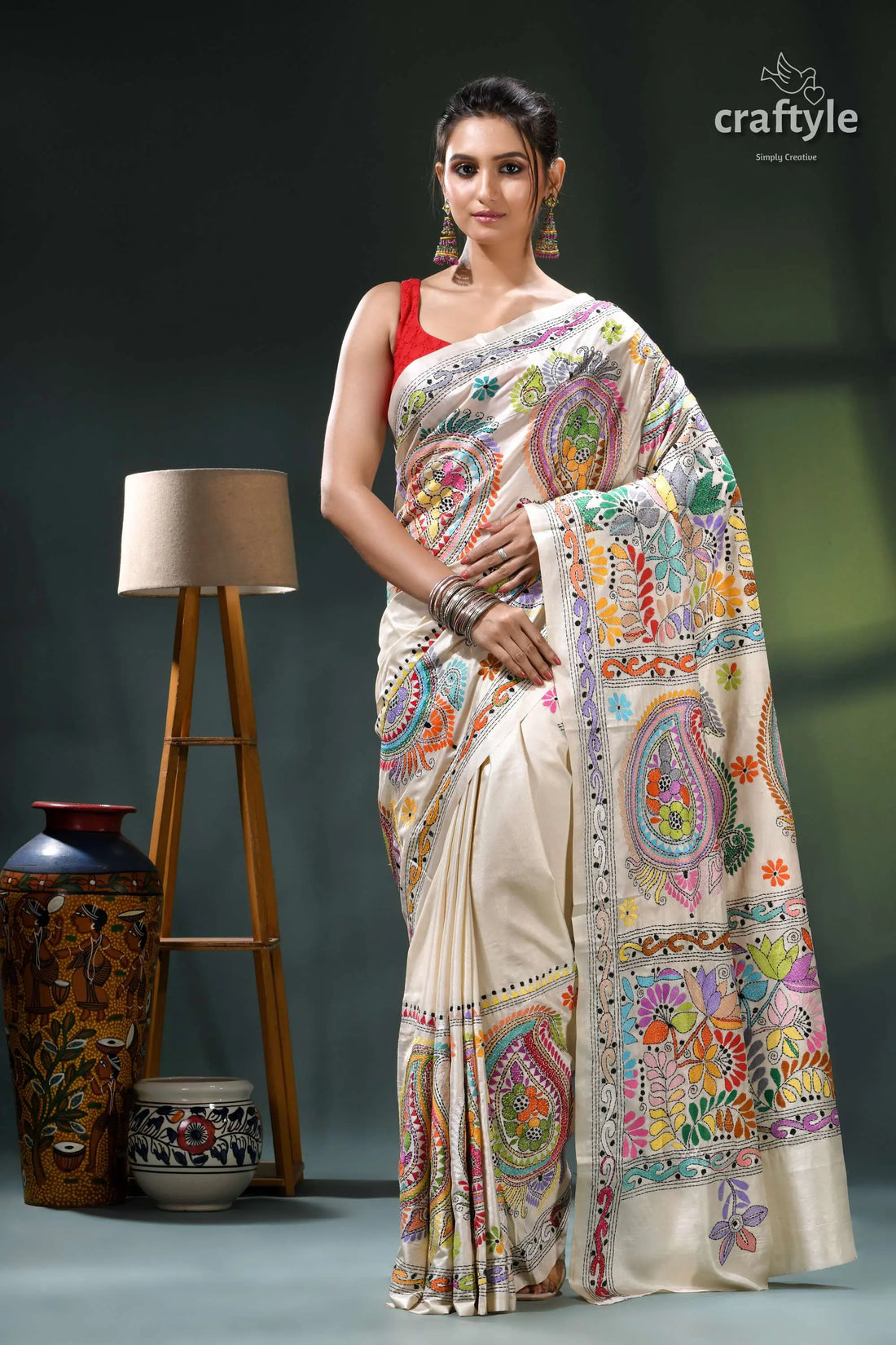 Multi-thread floral designer silk kantha work saree in white woman wears cream-colored silk saree 1