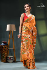 Multi-thread kutch embroidery marigold silk saree - mirror detailing orange green floral saree intricate 4