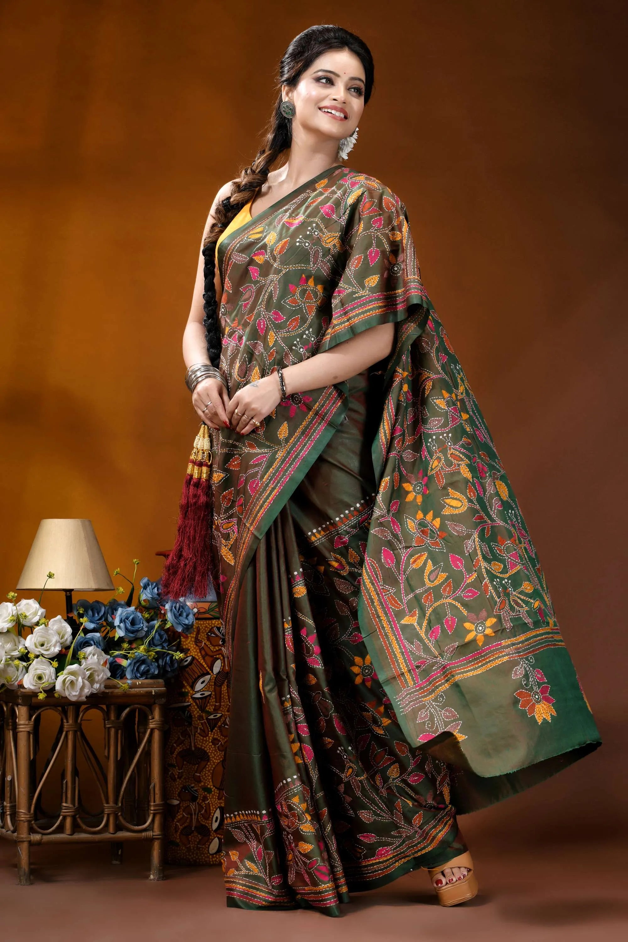 Multicolor floral design handmade jungle green silk kantha saree woman wears dark green silk 5