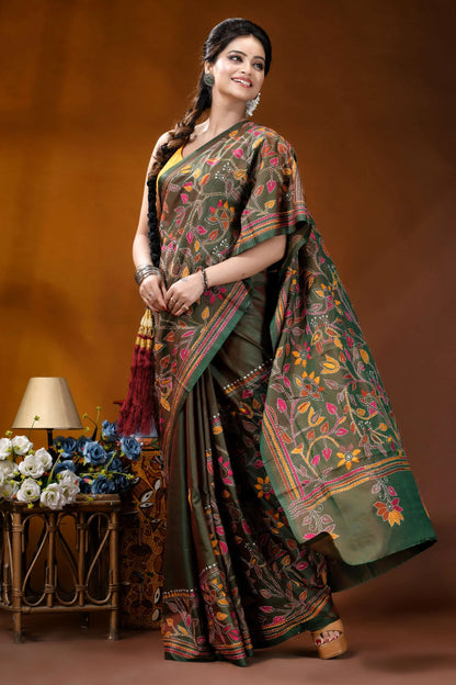 Multicolor floral design handmade jungle green silk kantha saree woman wears dark green silk 5