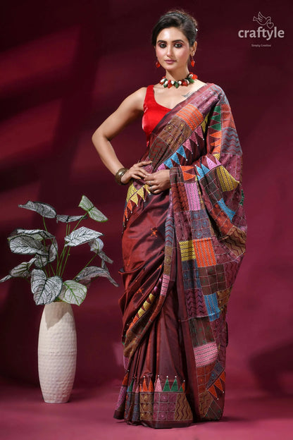 Multicolor geometric design silk kantha stitch saree - copper rust woman wears maroon silk saree 5