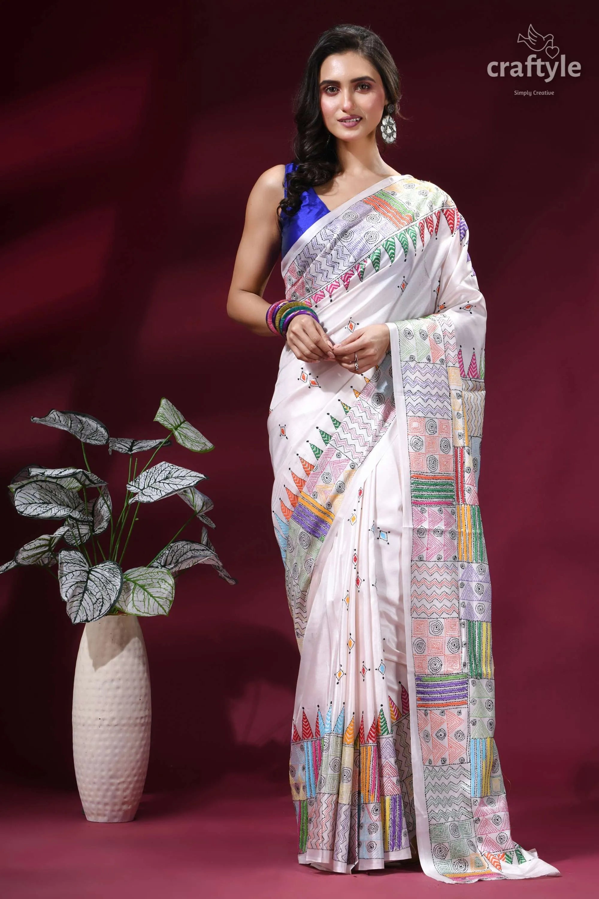 Multicolor geometric pattern silk kantha stitch saree in white woman wears white silk saree 1