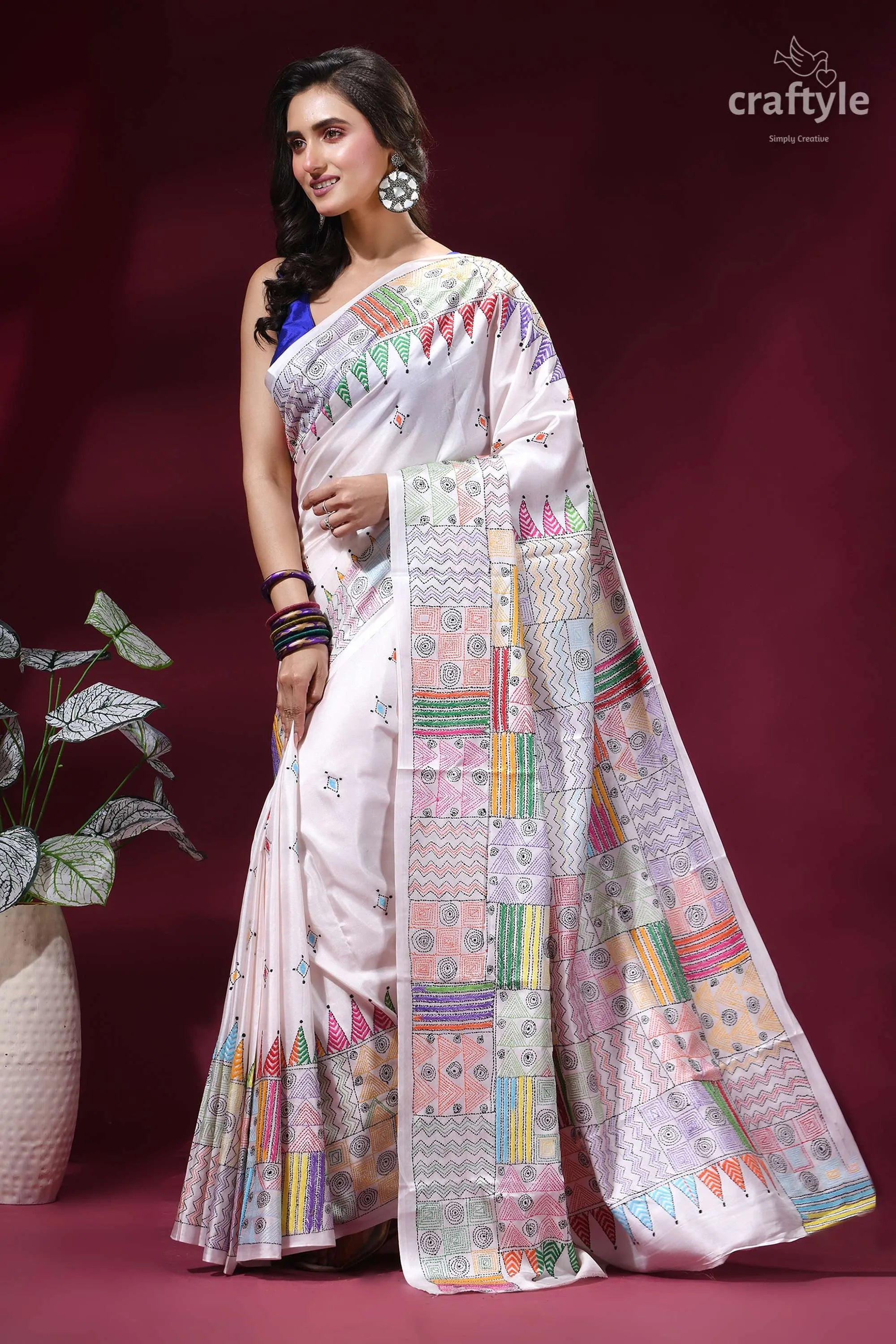 Multicolor geometric pattern silk kantha stitch saree in white woman wears white silk saree 3