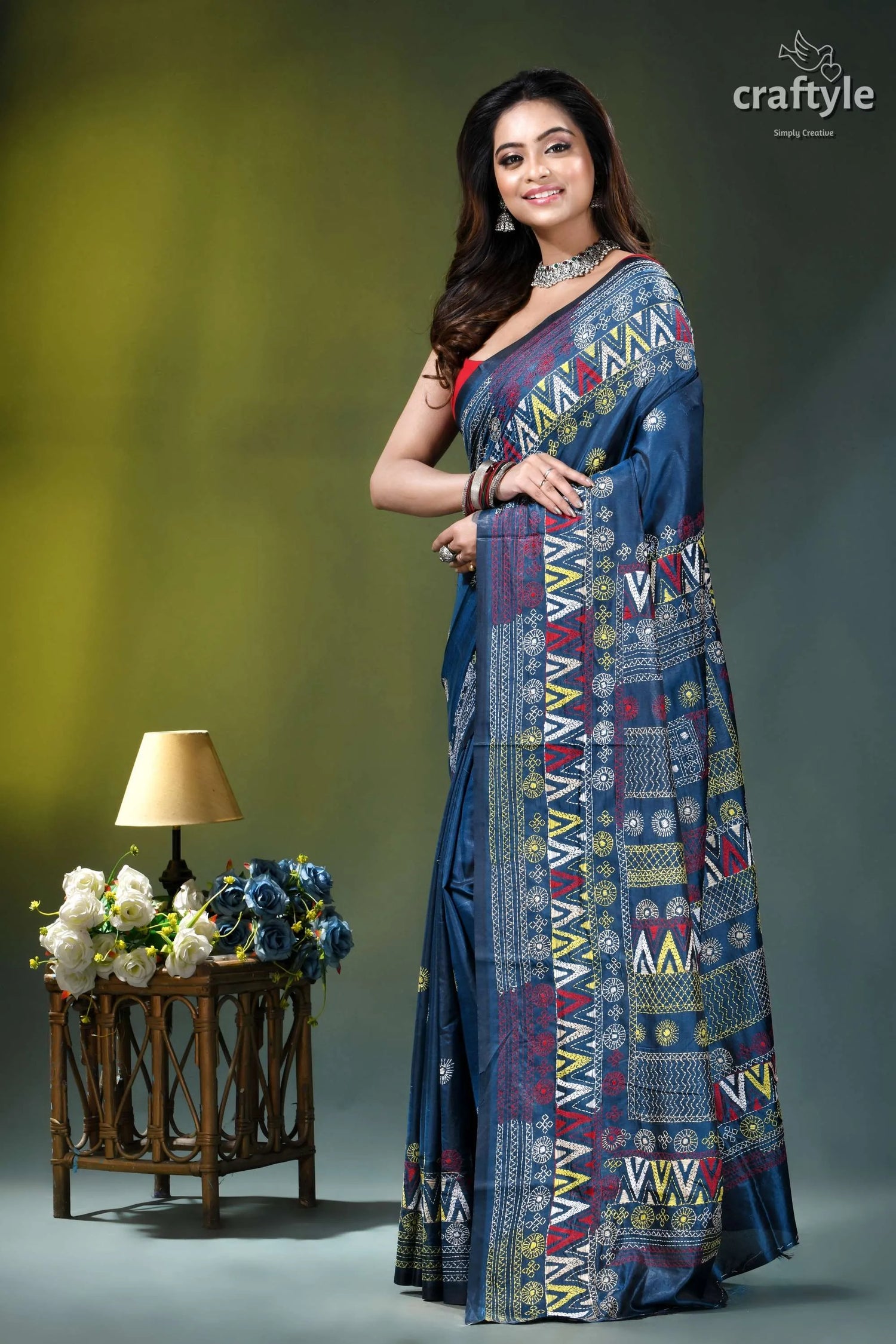 Multicolor hand embroidery silk lambani saree in dusk blue woman wears navy blue saree 3