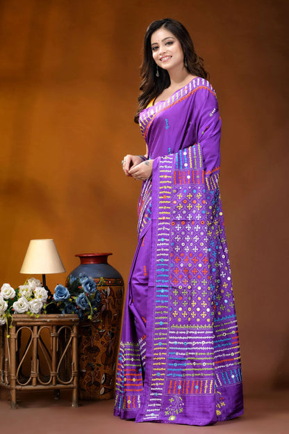 Multicolor thread kutch embroidery purple silk saree with mirror work detail vibrant purple saree intricate geometric 3