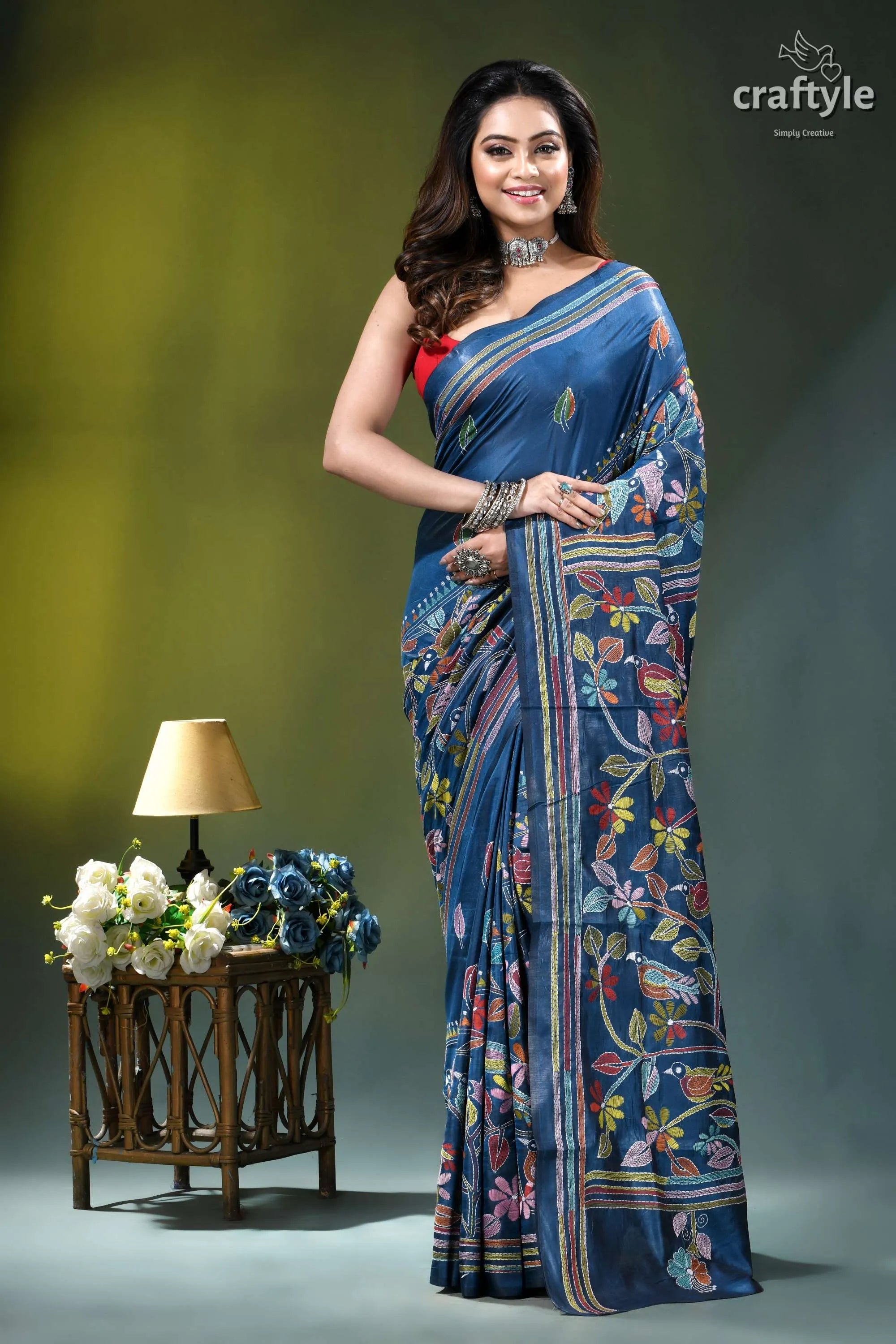 Muted blue exclusive bird design handcrafted kantha silk saree woman wears navy blue silk 1