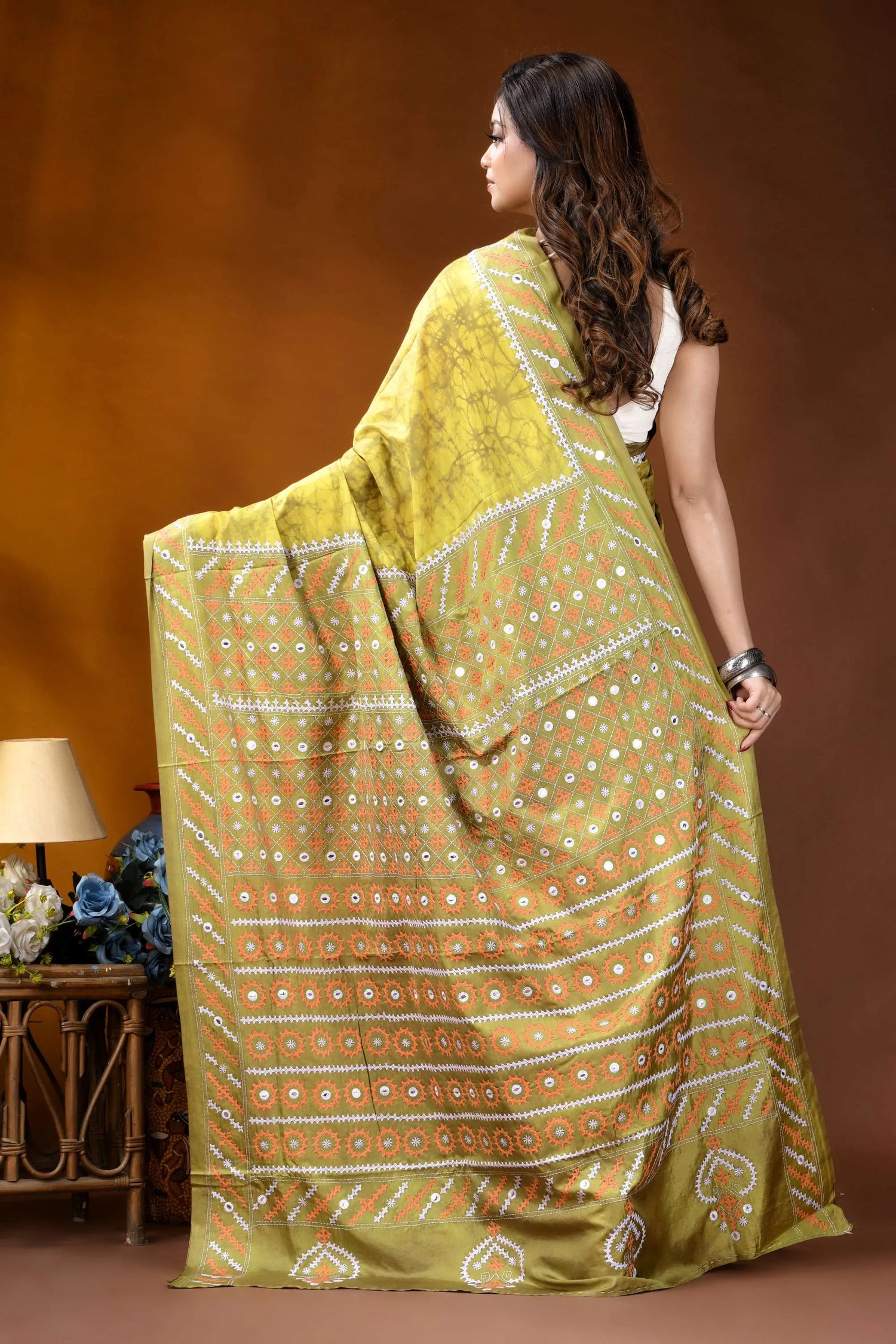 Naples yellow mirror work gujrati stitch dyed silk saree with ethnic hand batik design vibrant olive-green saree