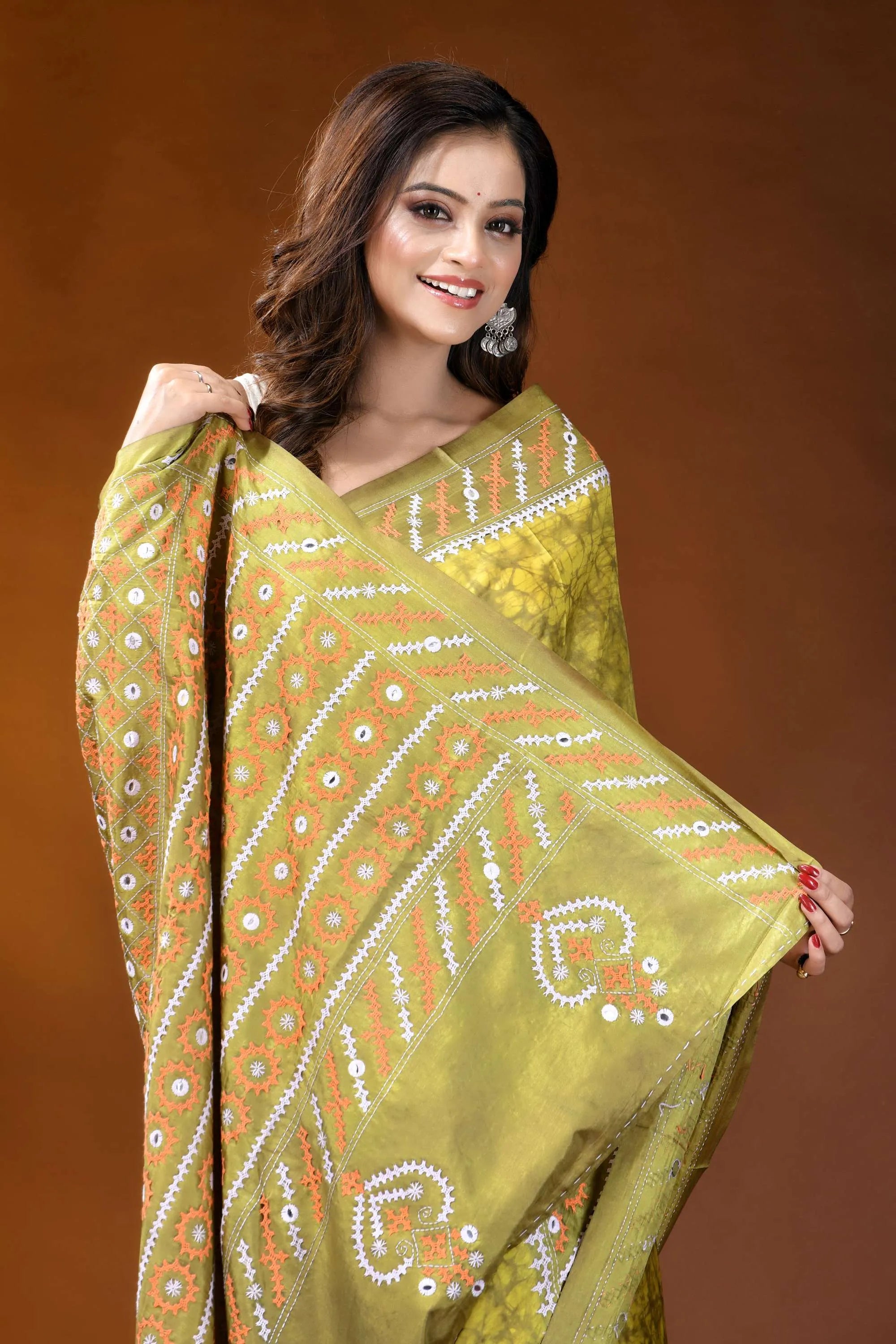 Naples yellow mirror work gujrati stitch dyed silk saree with ethnic hand batik design vibrant olive-green saree
