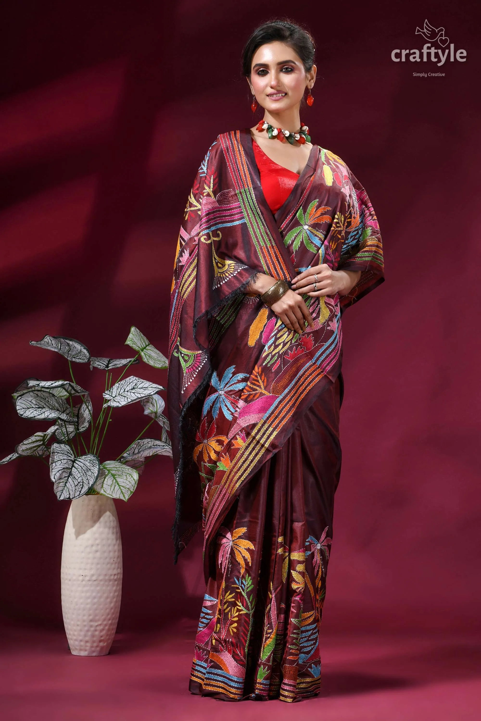 Nature theme handcrafted silk kantha stitch saree in wine woman wears maroon silk saree 5