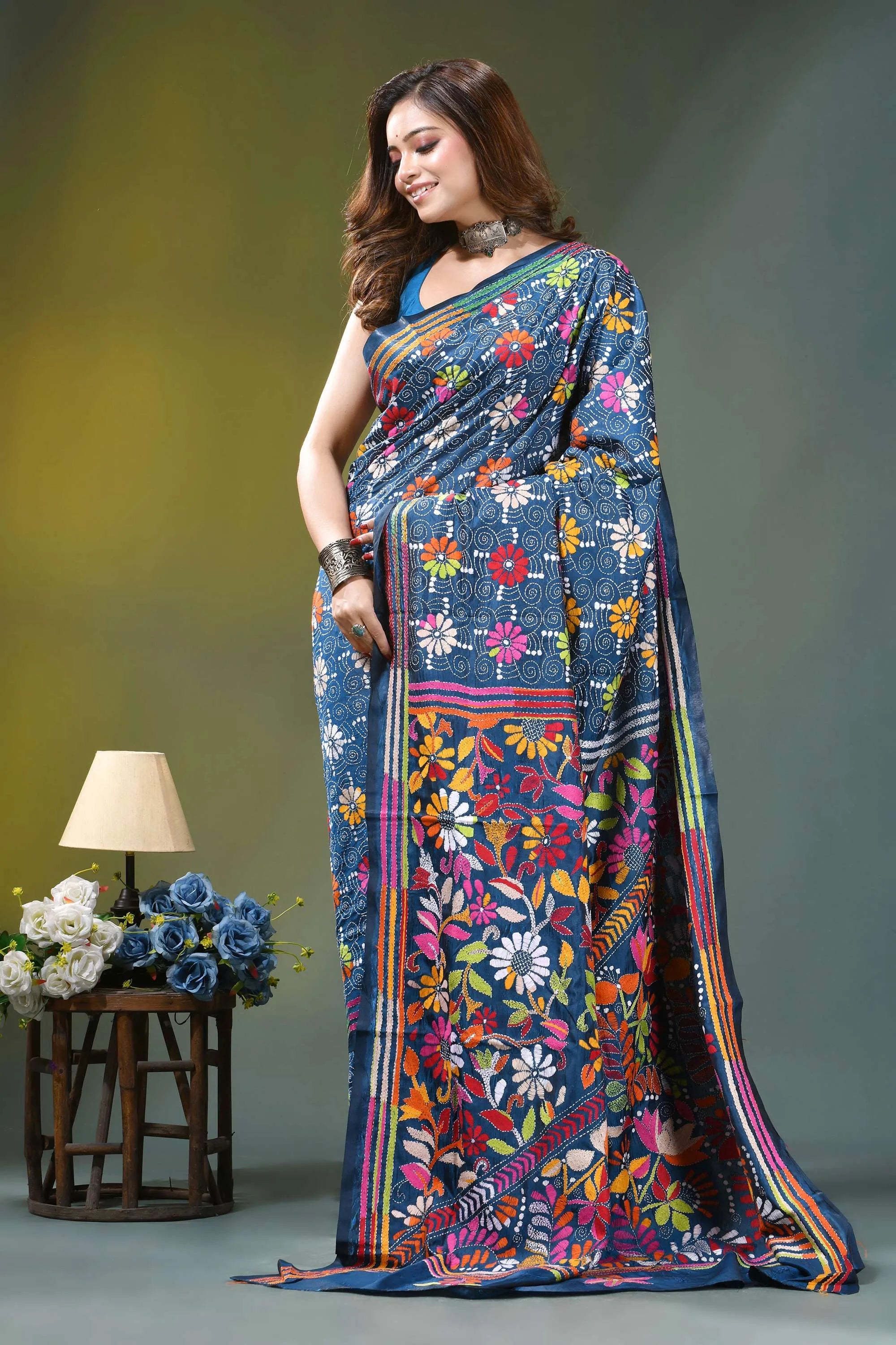 Navy blue intricate floral motif handcrafted silk kantha saree vibrant blue saree adorned colorful 4
