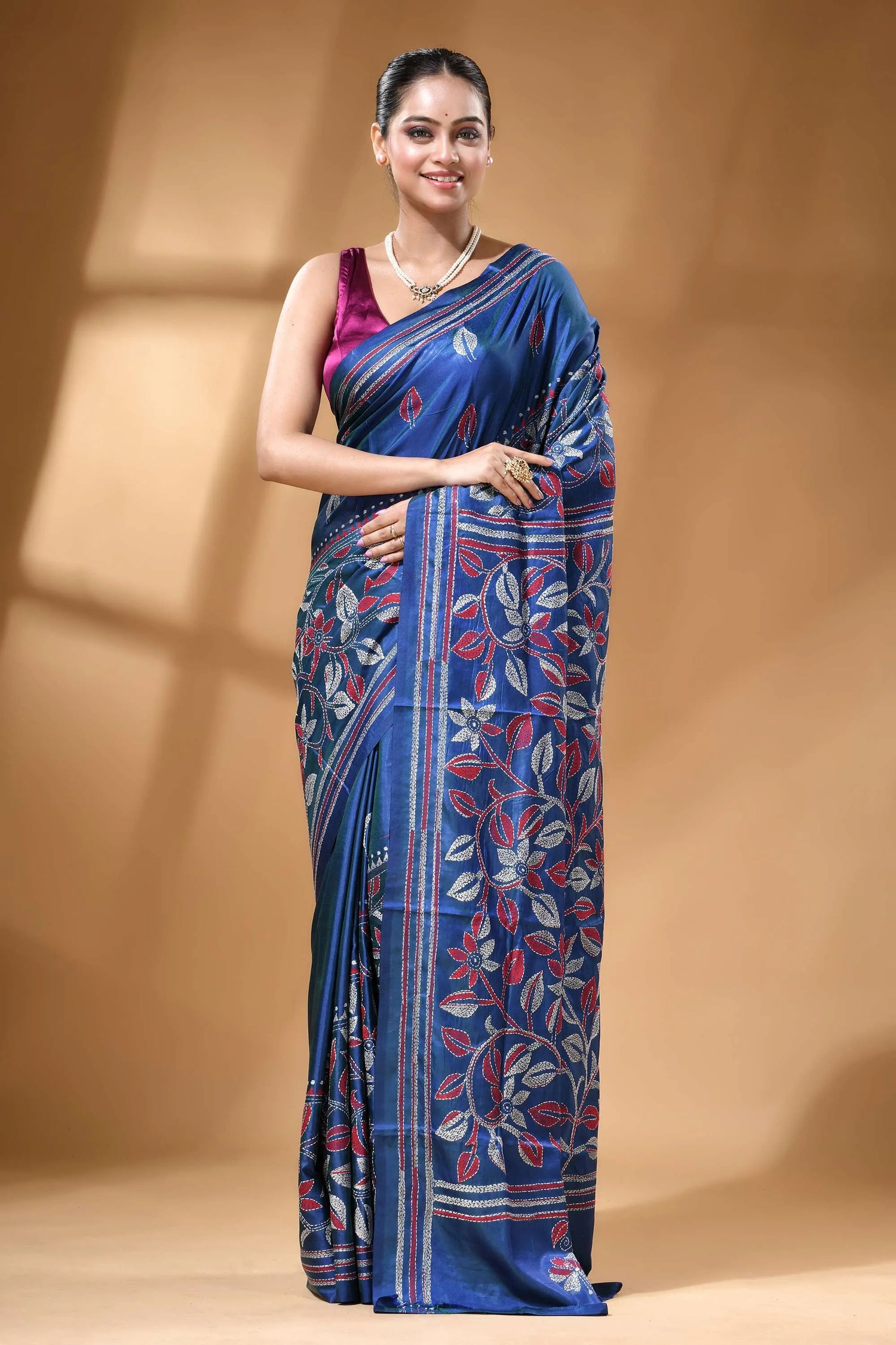 Navy blue multicolor flower motif silk kantha work saree woman wears deep blue silk 1