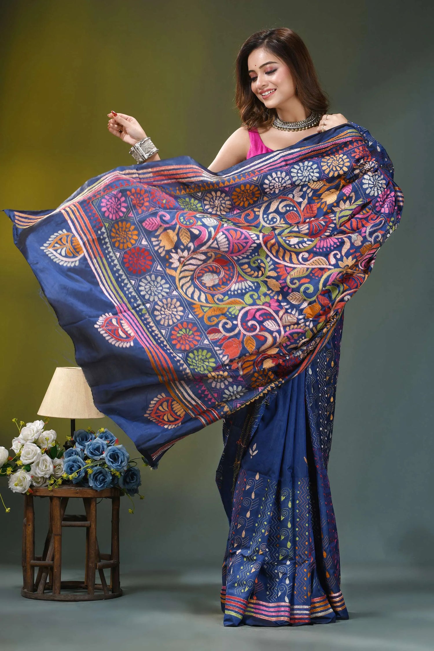 Navy blue paisley pattern hand embroidery kantha silk saree woman wears vibrant blue silk 4