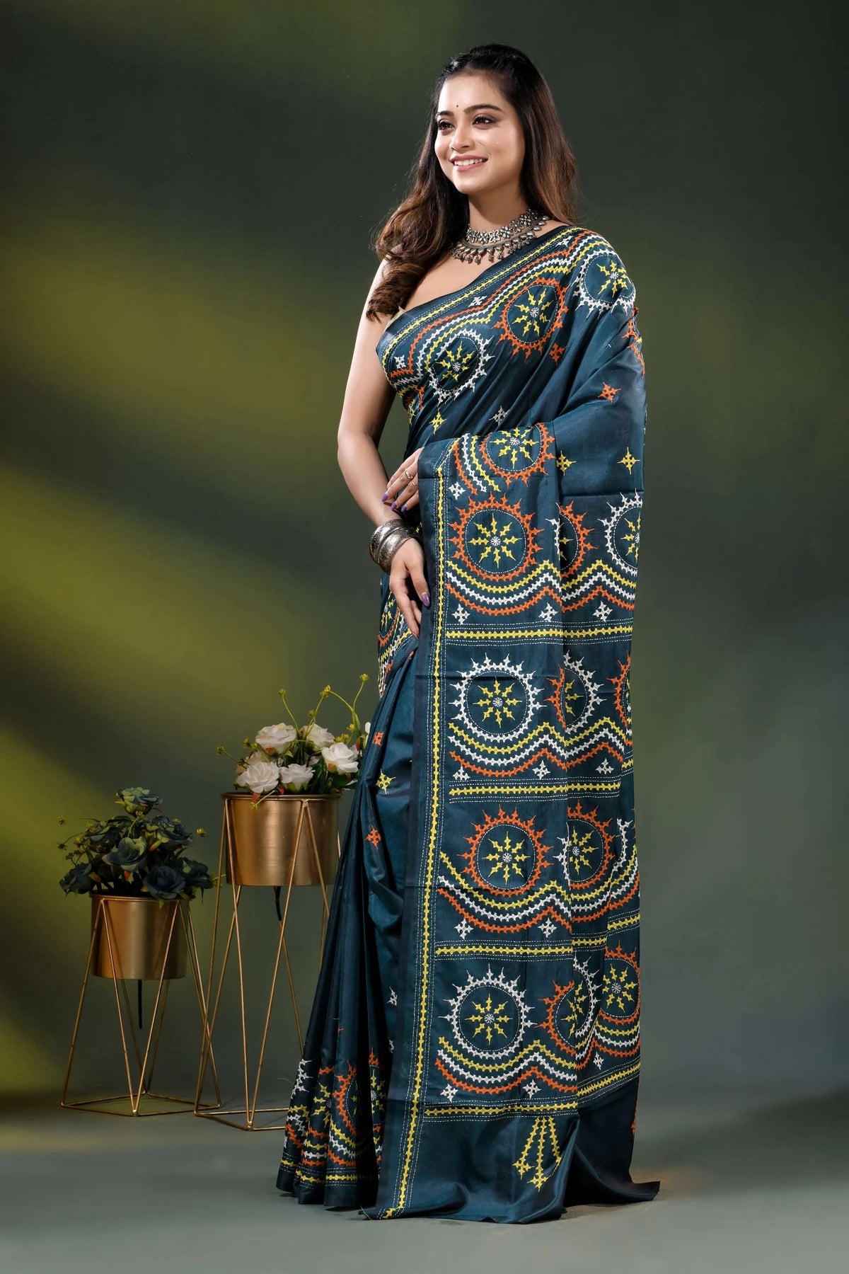 Navy blue silk kutch work saree with hand embroidered circular motifs 3
