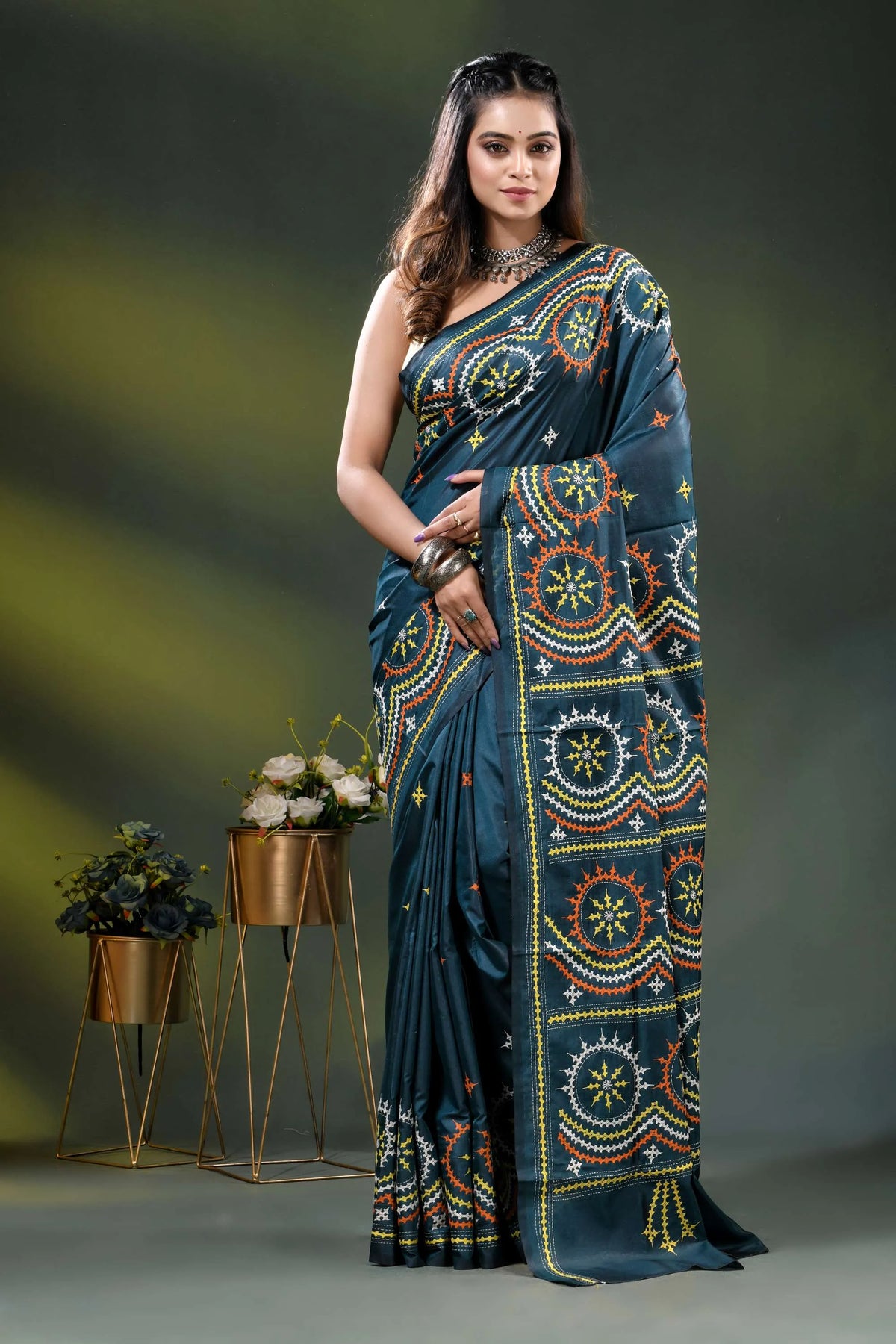 Navy blue silk kutch work saree with hand embroidered circular motifs 1