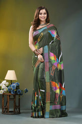 Olive green artisanal heron design silk kantha work saree woman wears dark green silk 1