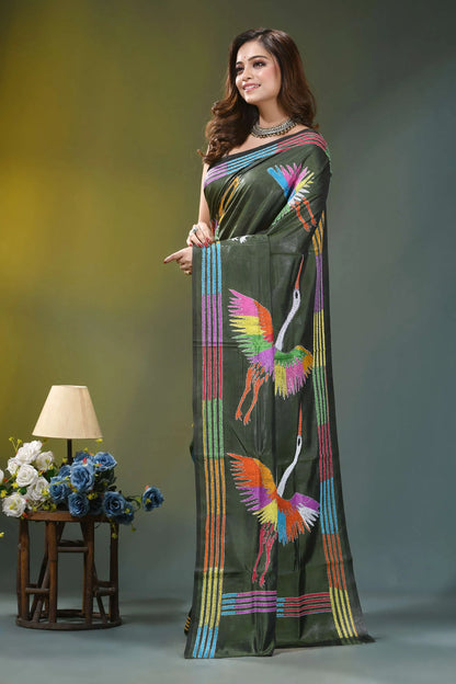 Olive green artisanal heron design silk kantha work saree woman wears olive green saree 3