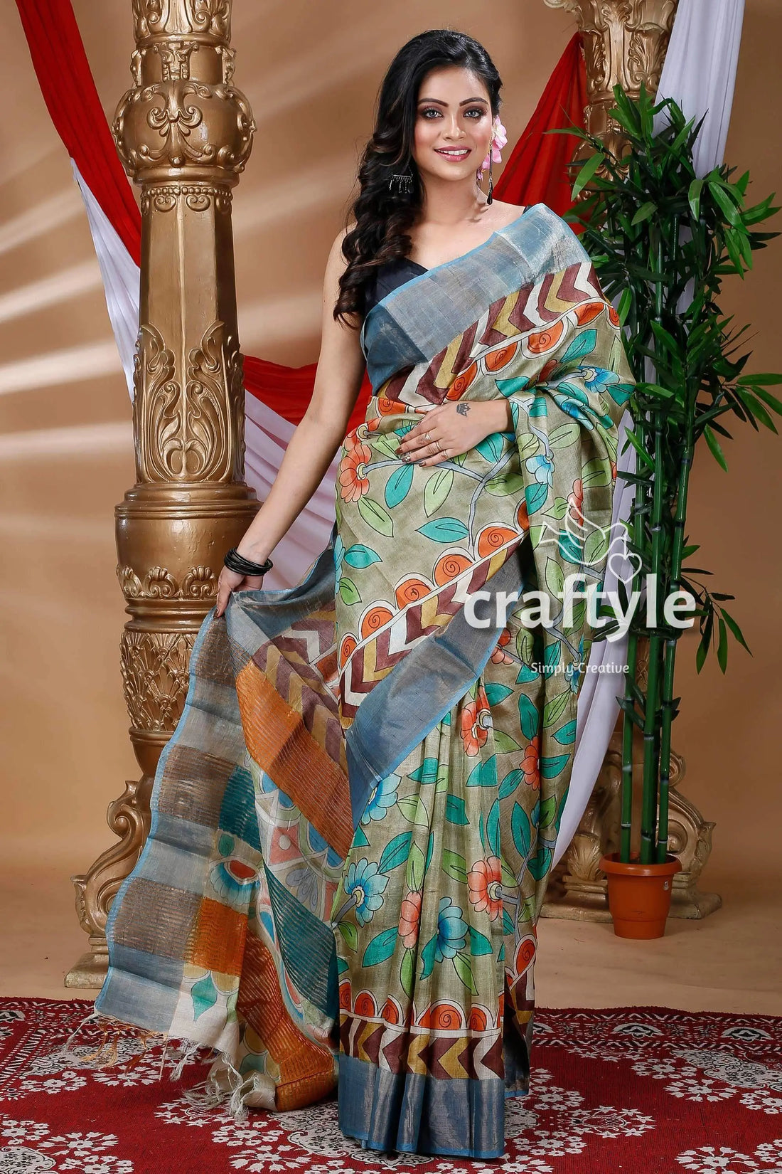 Olive green hand painted zari pure tussar kalamkari sari woman floral geometric patterned saree 1