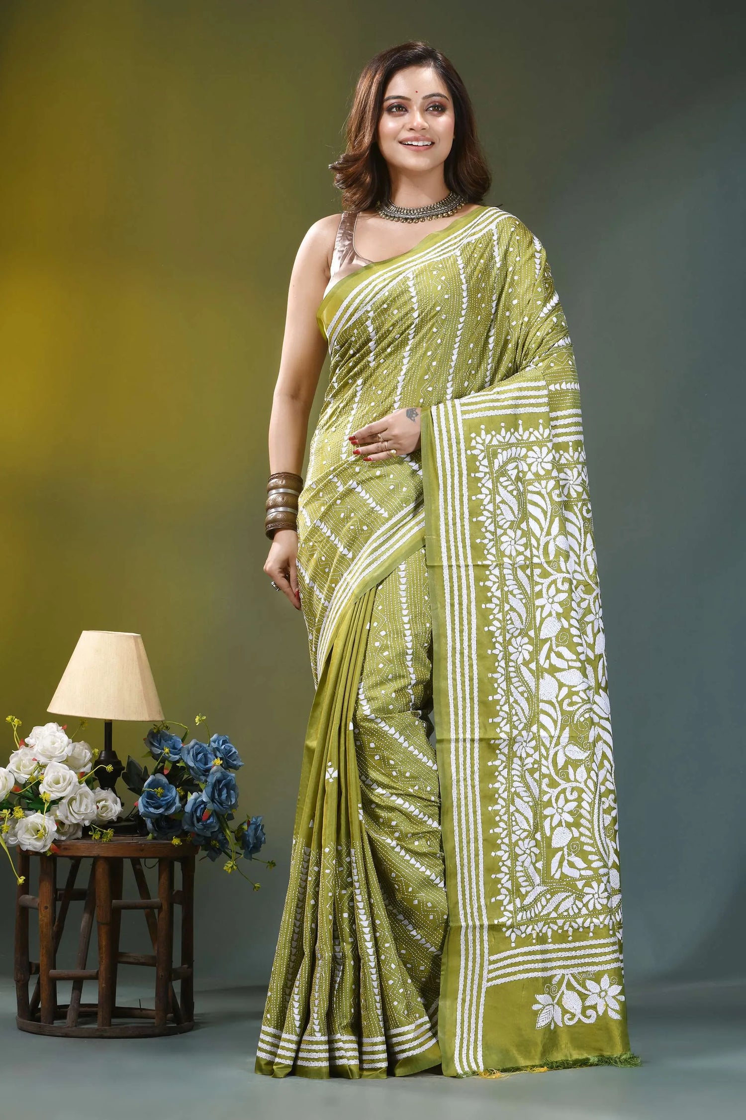 Olive green paisley floral hand embroidered silk kantha saree woman wears vibrant olive green 6
