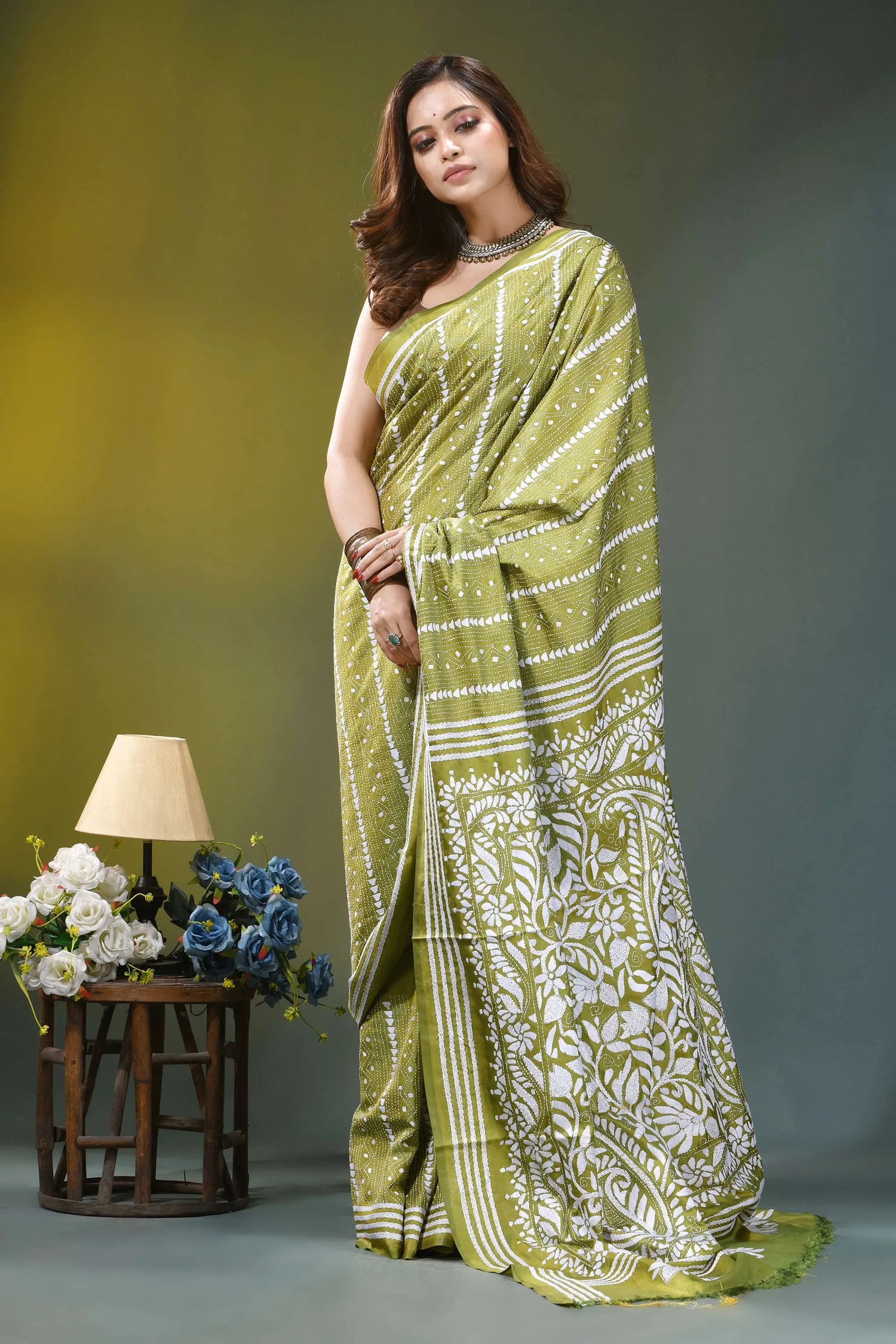 Olive green paisley floral hand embroidered silk kantha saree woman wears vibrant olive green 4