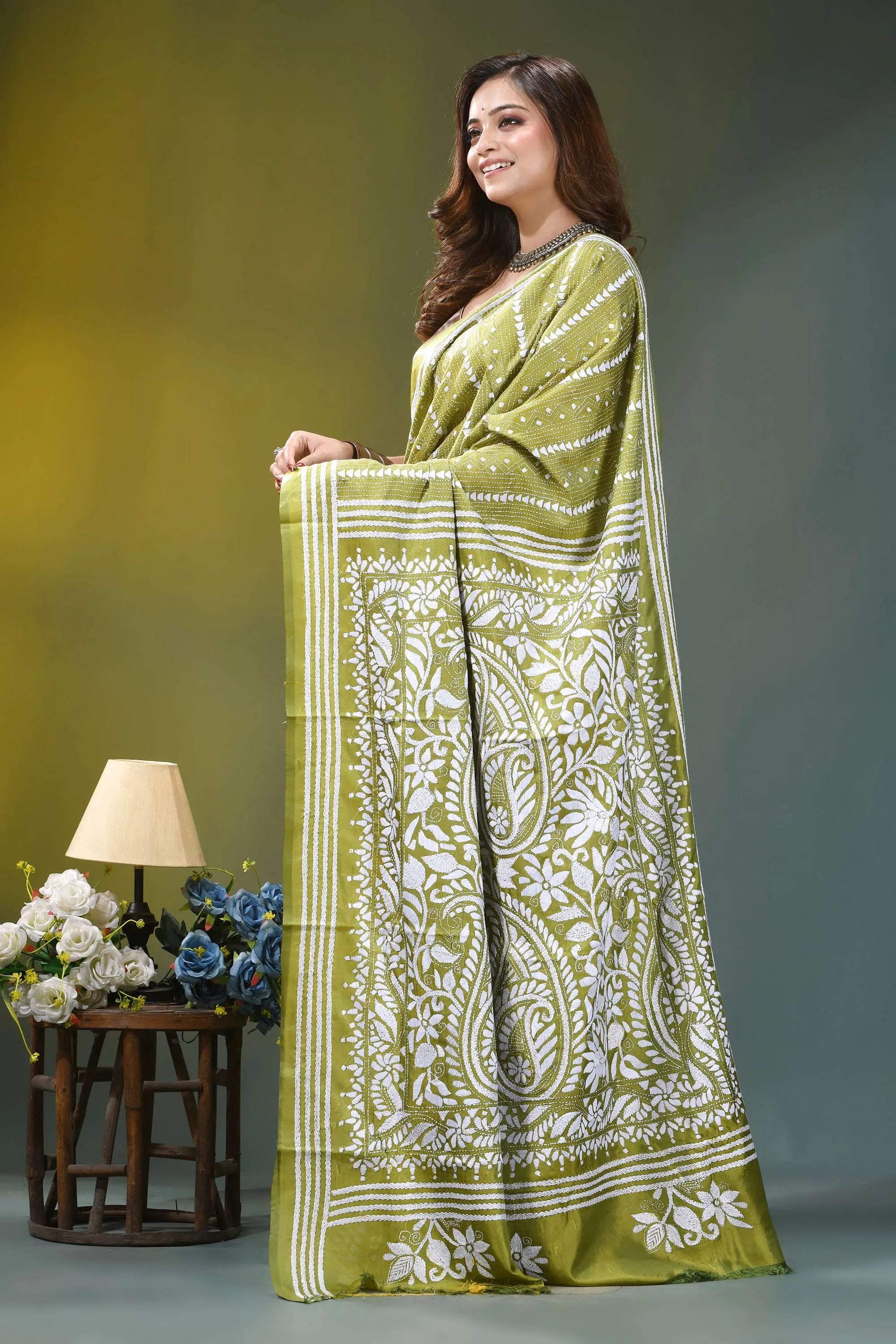 Olive green paisley floral hand embroidered silk kantha saree woman wears vibrant olive green 3