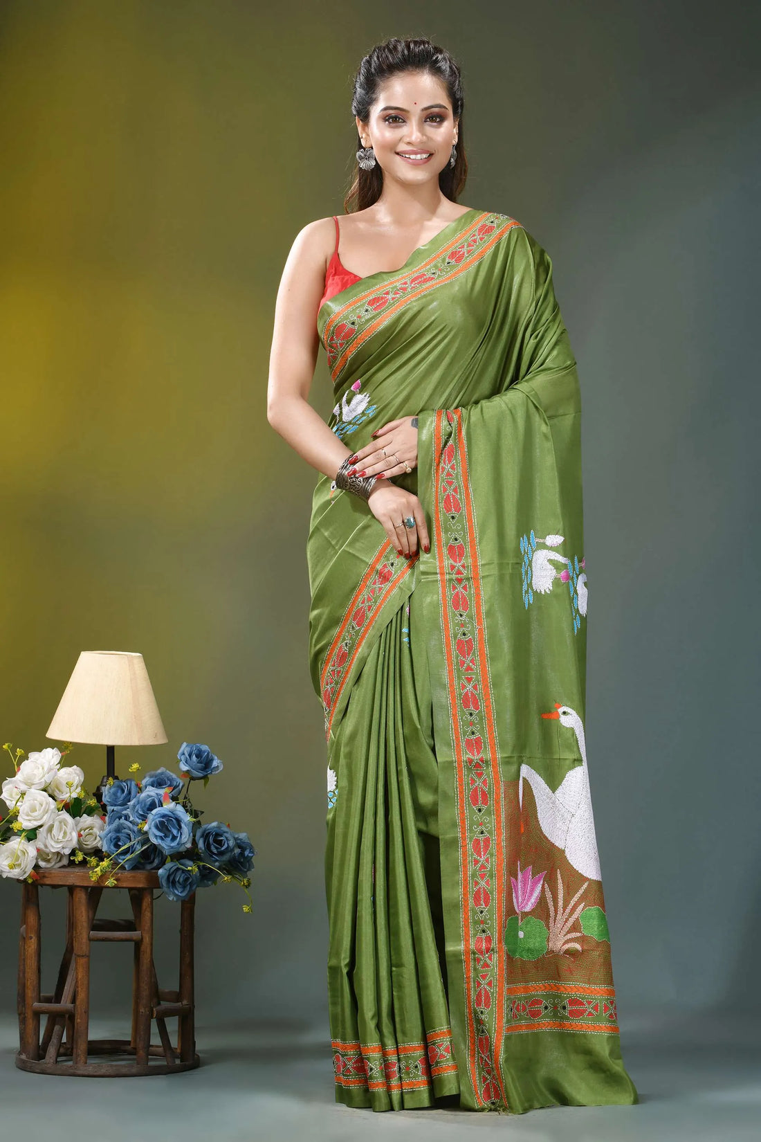 Olive green swan motif handcrafted silk kantha saree vibrant olive green silk saree 1