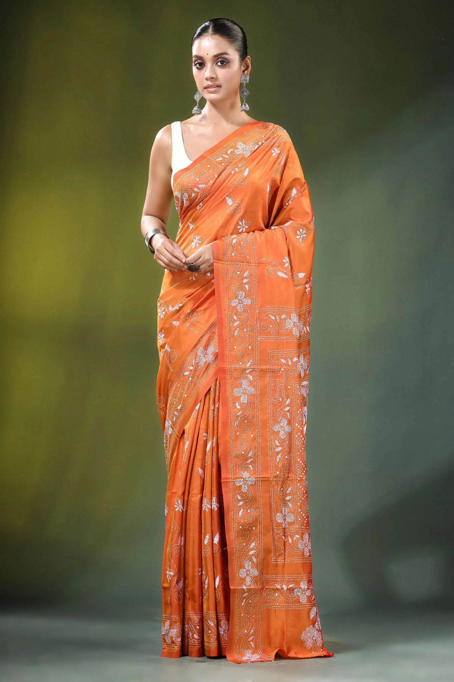 Orange floral motif hand embroidered silk kantha saree vibrant intricate white 1
