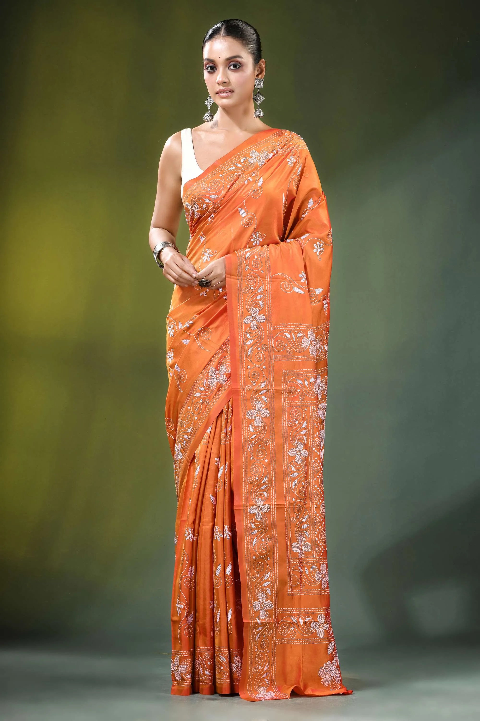 Orange floral motif hand embroidered silk kantha saree vibrant intricate white 1