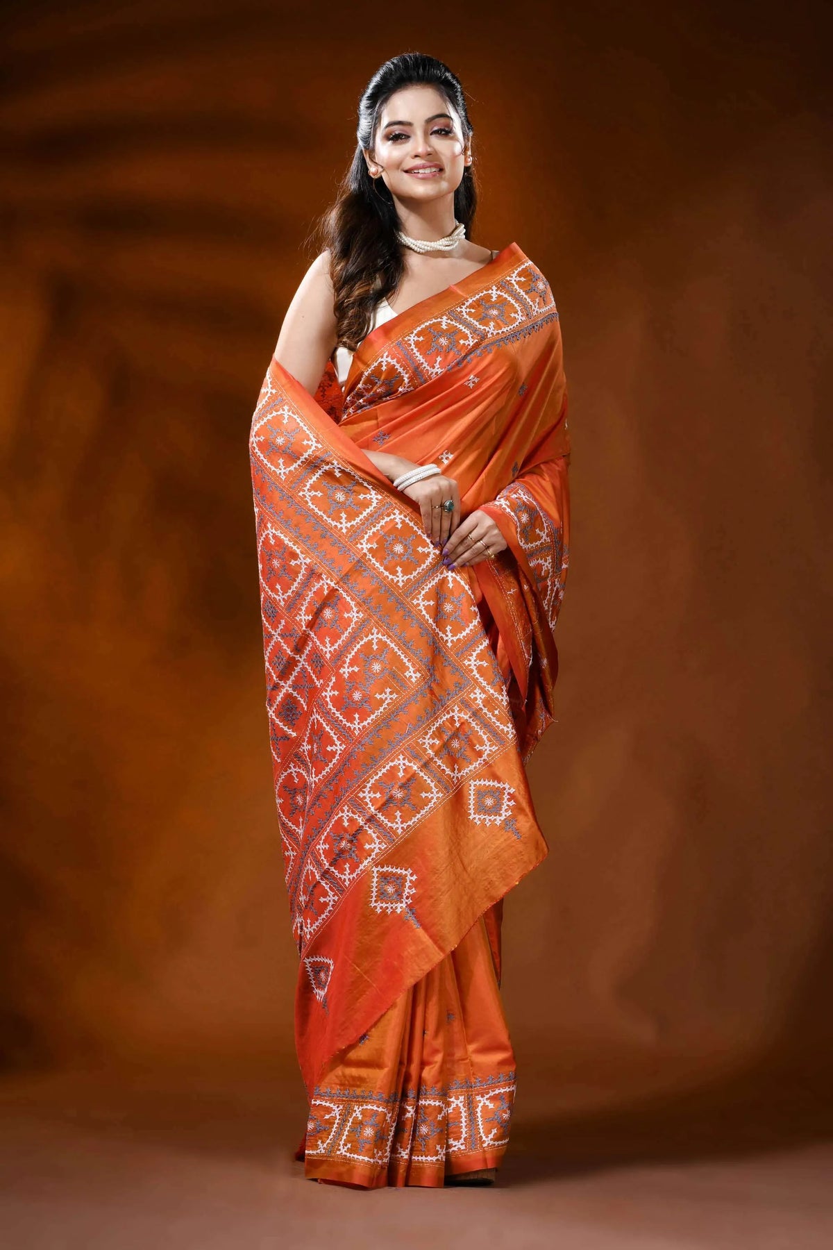 Orange gujarati stitch silk saree with handcrafted geometric design 4