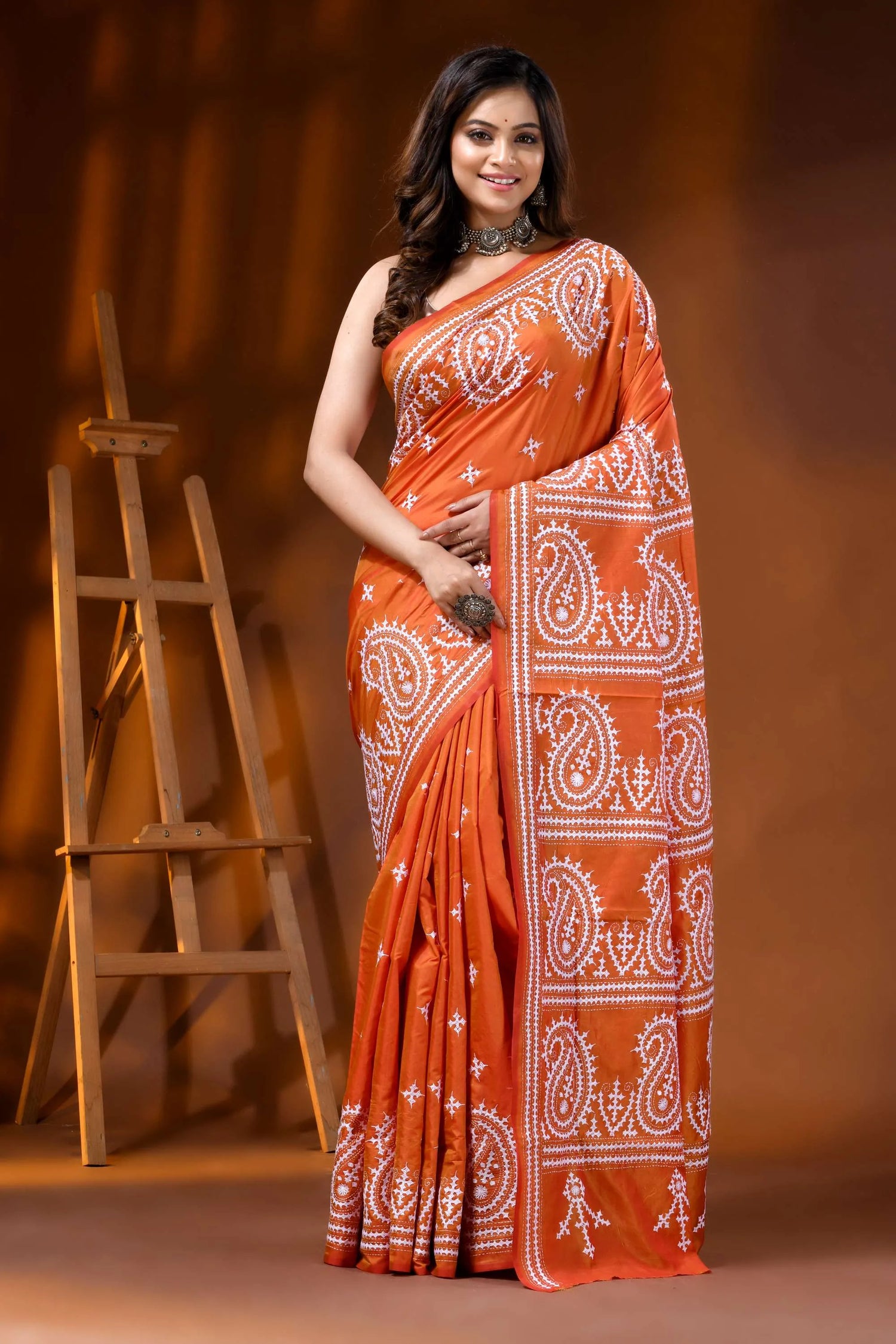 Orange silk gujarati stitch saree with hand embroidered paisley design 1