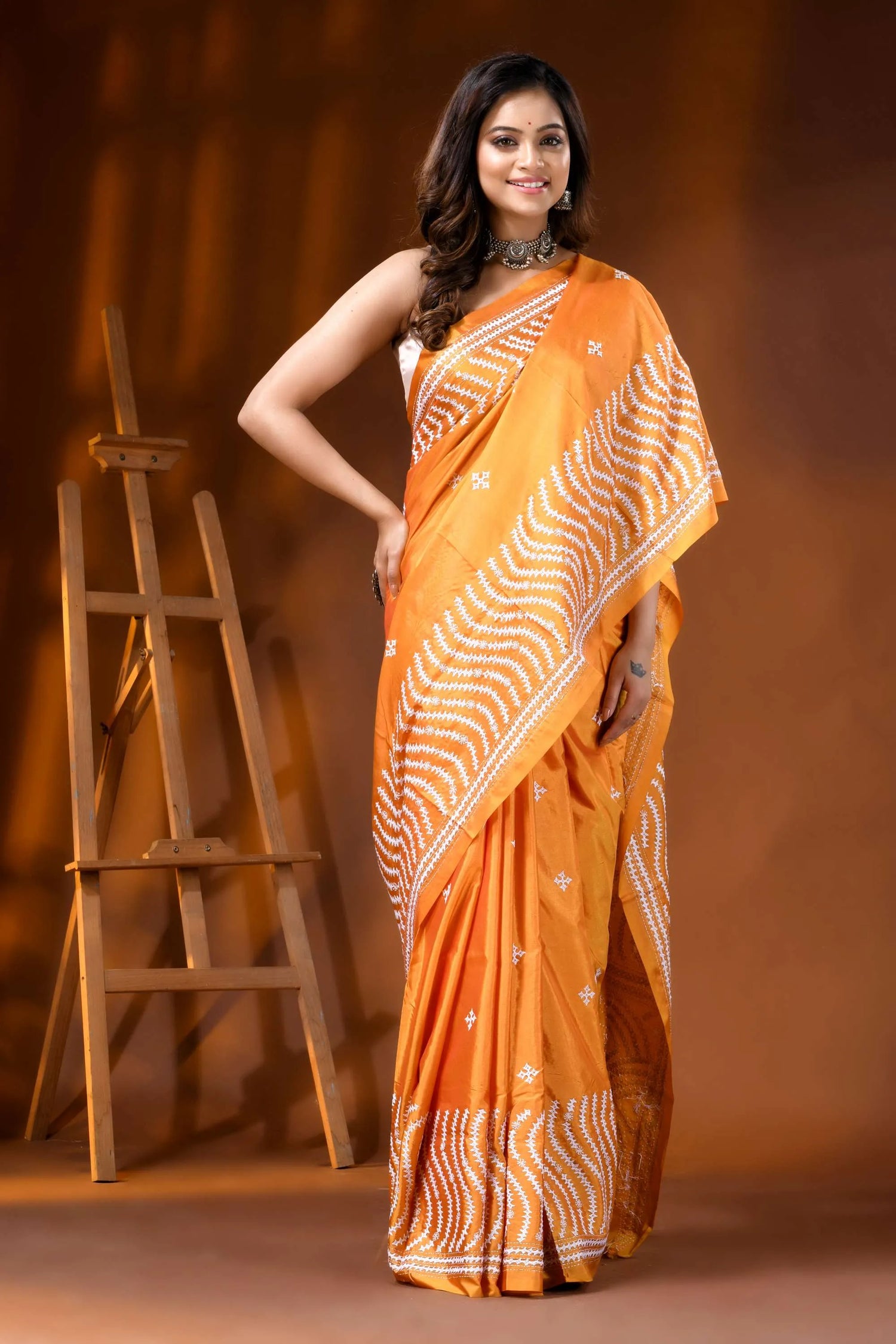 Orange silk handmade kutch work saree with geometric design 4
