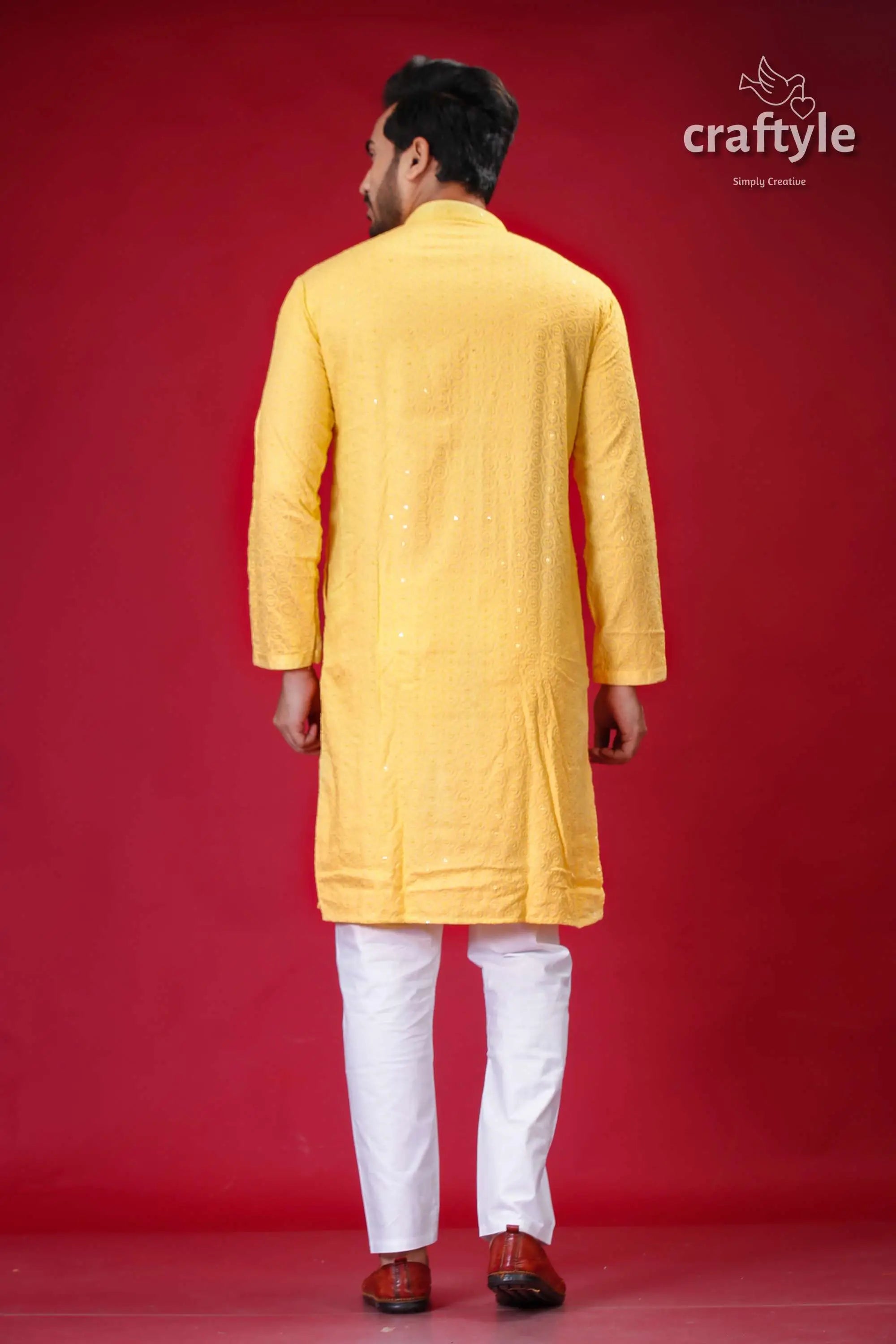Pale yellow chikankari punjabi for men with sequin embellishments yellow kurta white pants 5