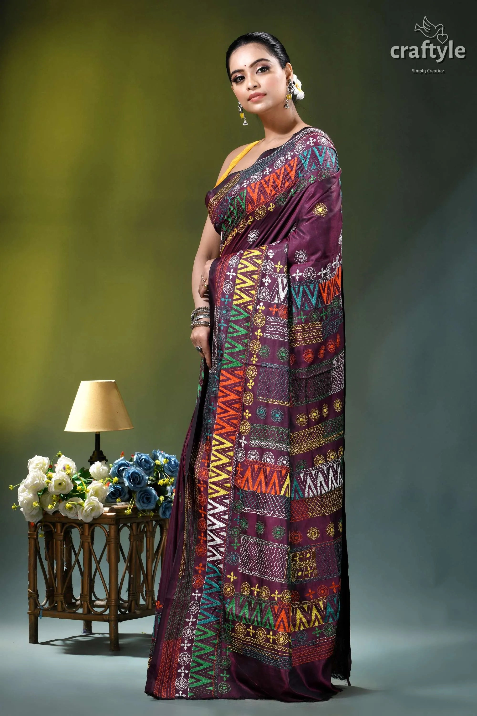 Pansy purple multithread hand embroidered geometric silk lambani saree woman wears richly patterned maroon 3