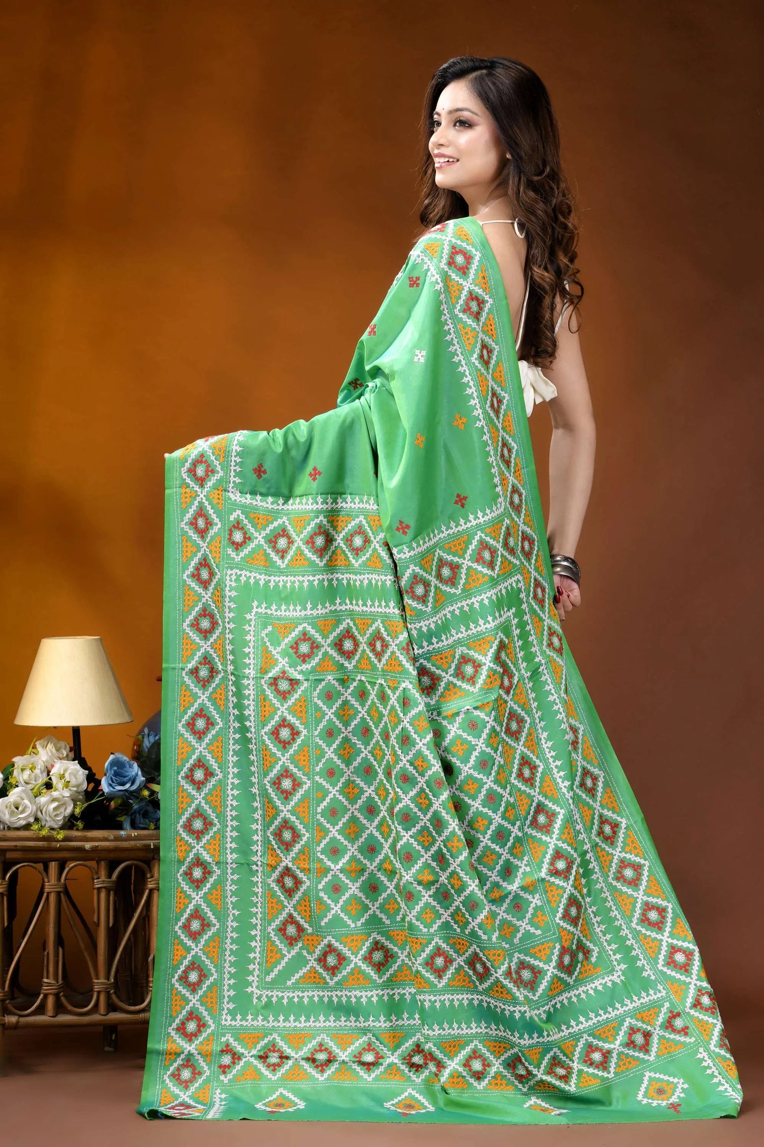 Parrot green ethnic motif handcrafted gujrati stitch silk saree vibrant green saree intricate geometric 5