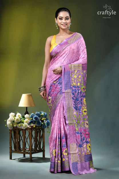 Pastel violet floral design hand batik silk kantha stitch saree woman wears vibrant pink saree 1