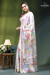 Peacock motif multicolor thread silk kantha saree in white woman wears white silk saree 2