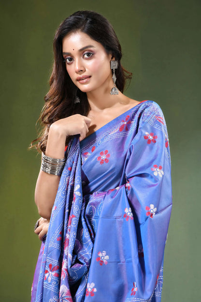 Periwinkle blue folk art silk kantha saree - hand embroidered woman wears vibrant 2