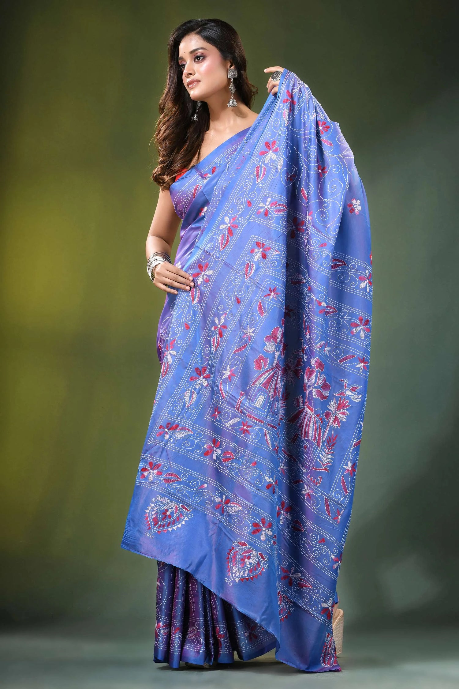 Periwinkle blue folk art silk kantha saree - hand embroidered woman wears vibrant 8
