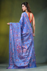 Periwinkle blue folk art silk kantha saree - hand embroidered woman wears vibrant 7