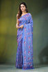 Periwinkle blue folk art silk kantha saree - hand embroidered woman wears vibrant 1