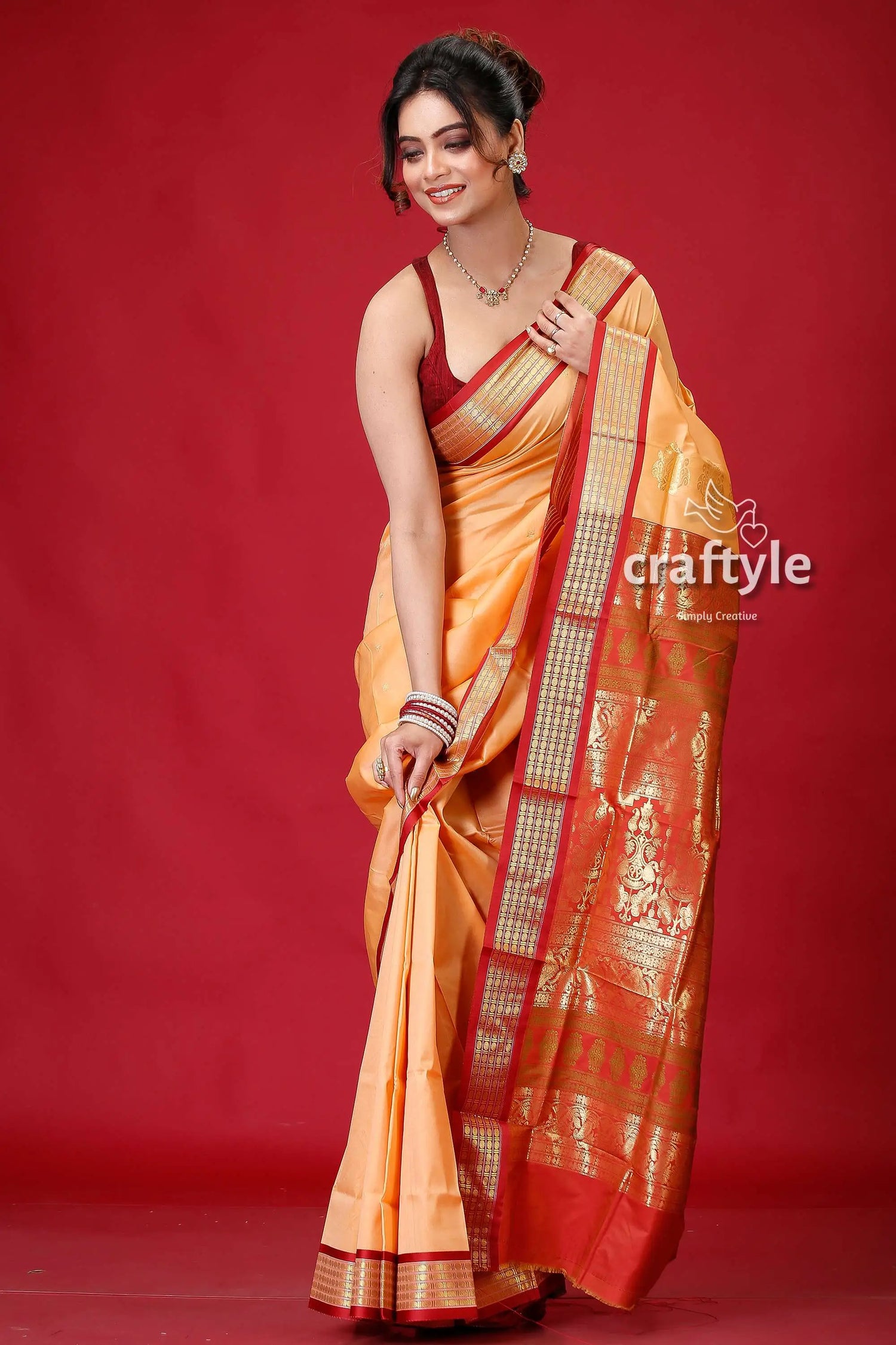 Persian orange bomkai silk saree with zari edging woman peach red saree 4