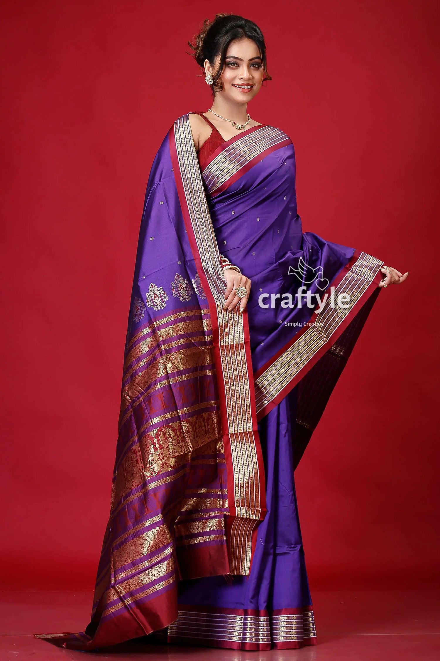 Pigment blue bomkai silk saree with woven zari border purple maroon saree gold accents 4