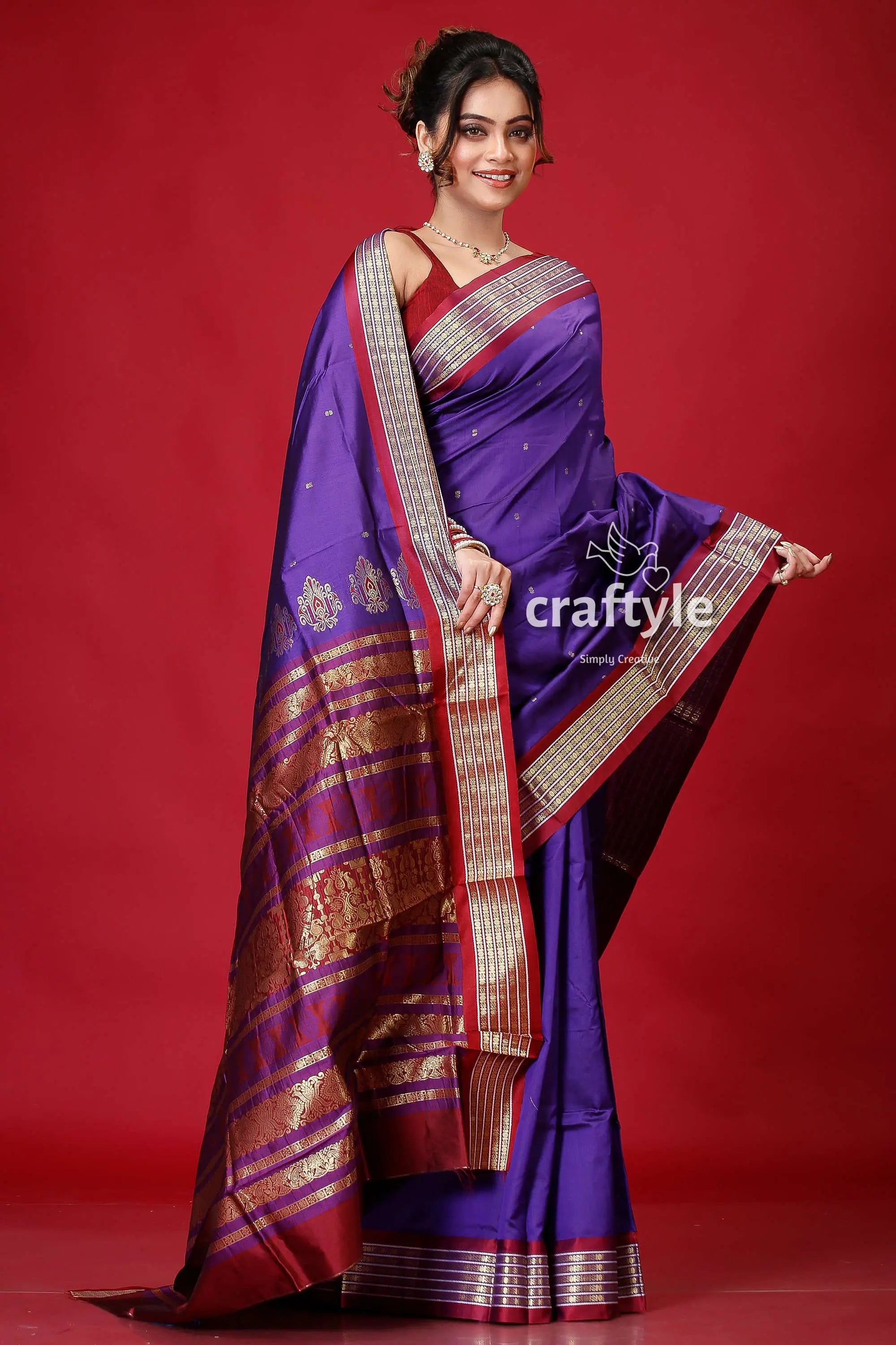 Pigment blue bomkai silk saree with woven zari border purple maroon saree gold accents 4