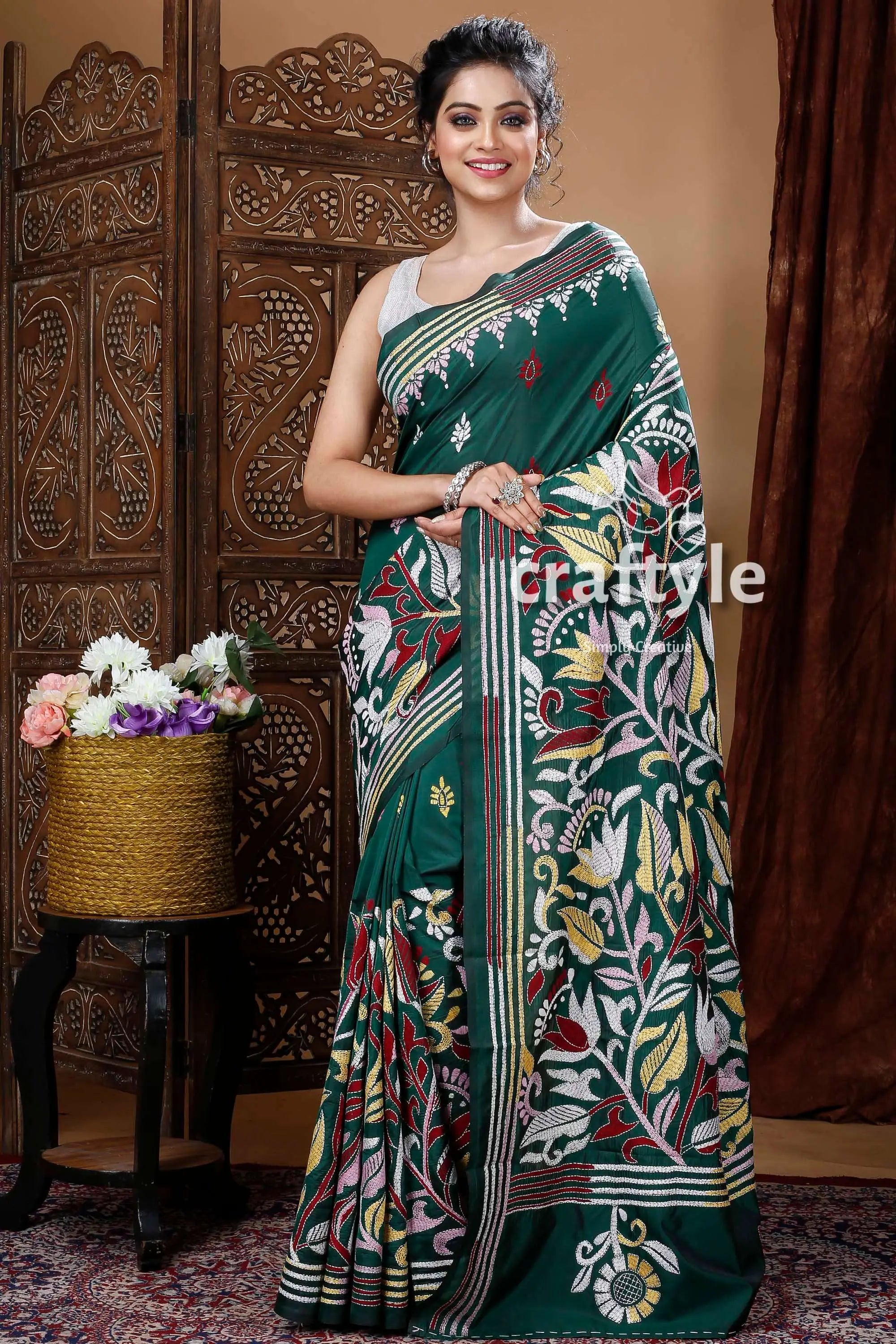 Pine green floral motif silk kantha saree green floral embroidered saree 1