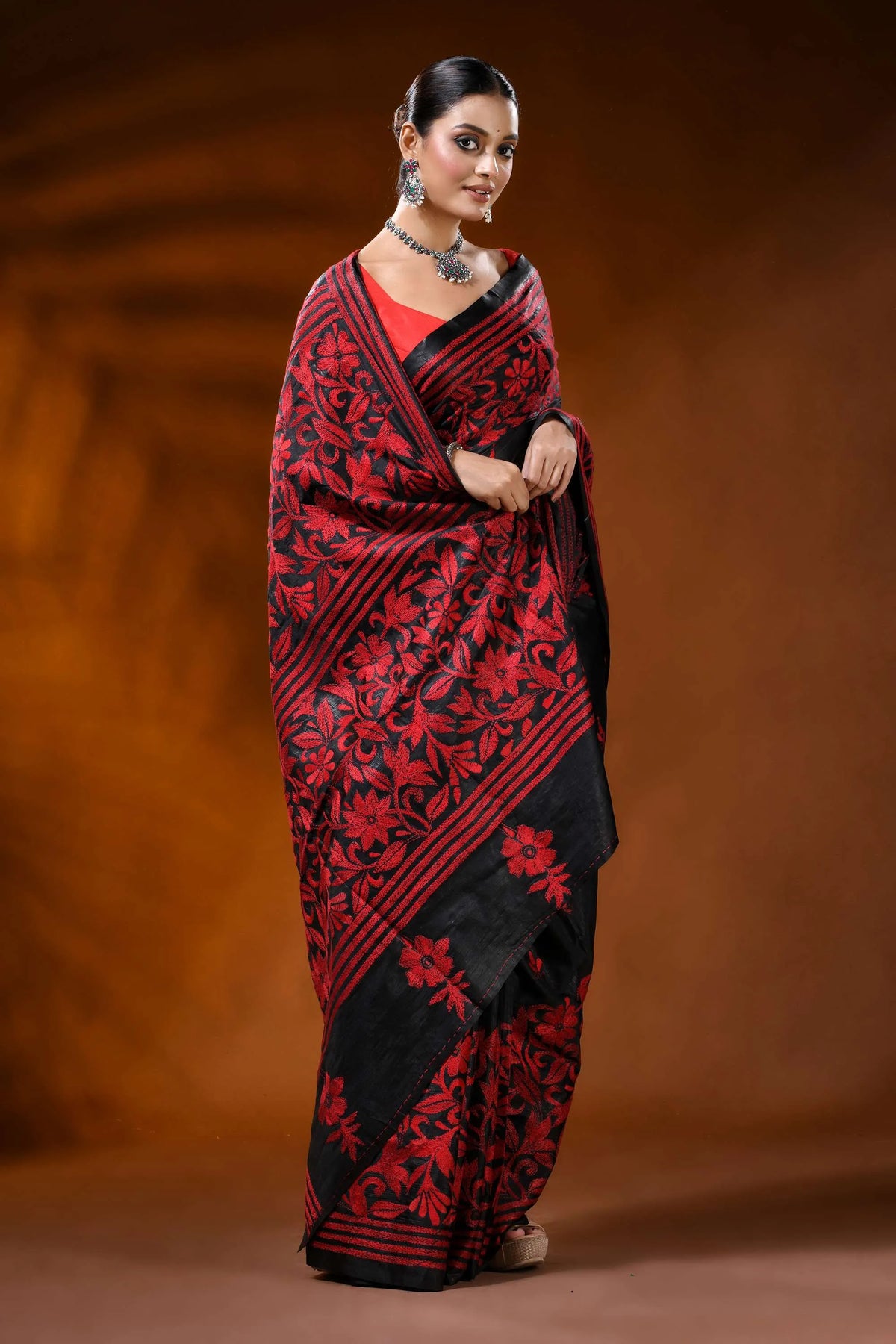 Pitch black kantha embroidery silk saree with red floral design 4