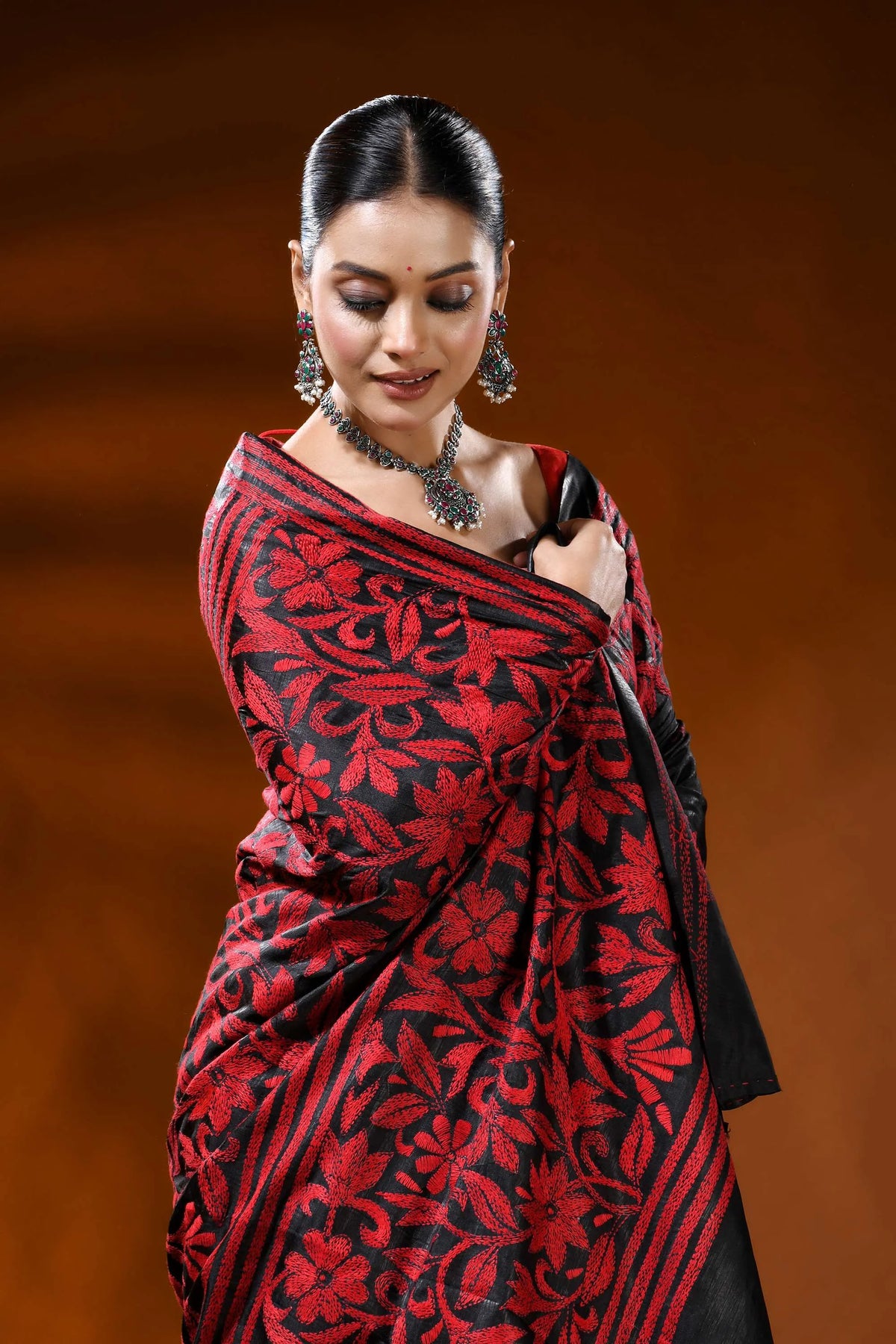 Pitch black kantha embroidery silk saree with red floral design 5