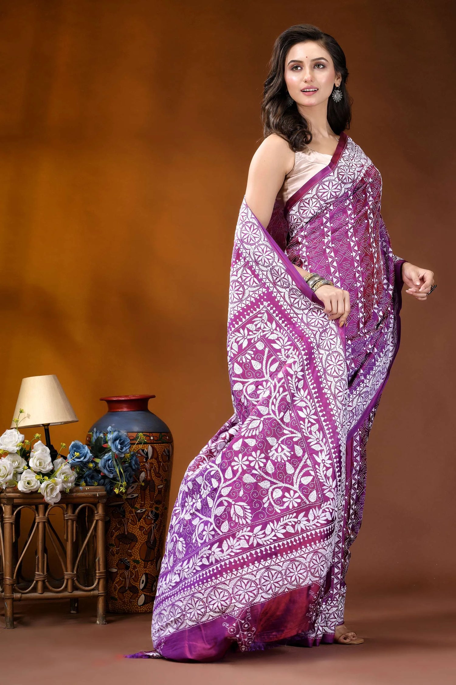 Plum floral design handcrafted silk kantha work saree woman wears vibrant purple white 4