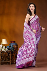 Plum floral design handcrafted silk kantha work saree woman wears vibrant purple white 4