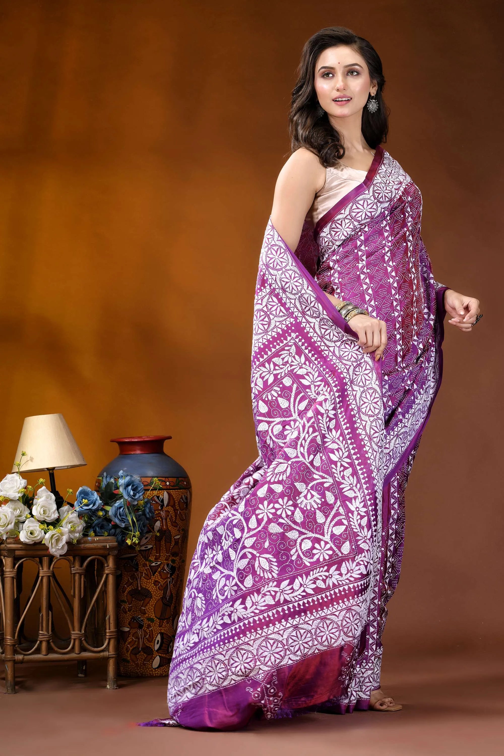 Plum floral design handcrafted silk kantha work saree woman wears vibrant purple white 4